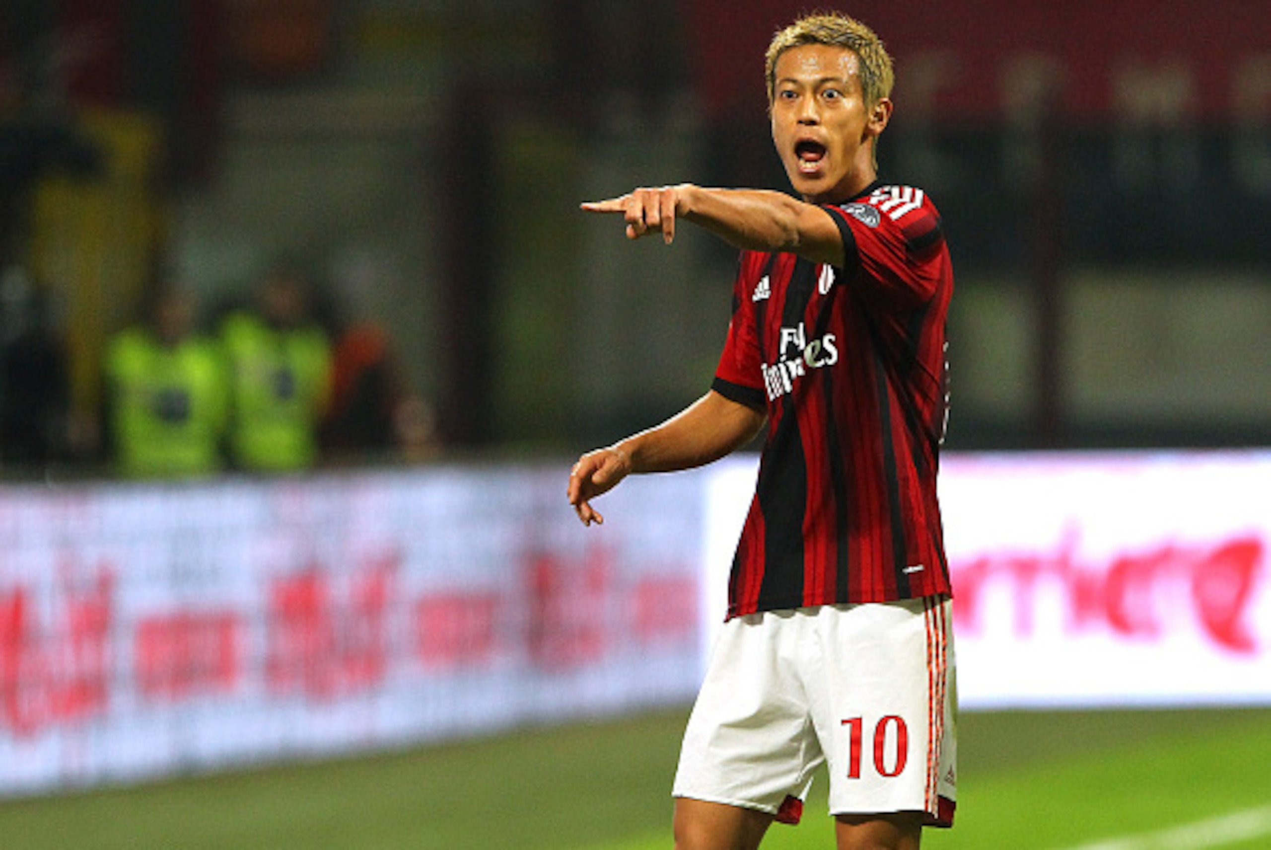 MILAN, ITALY - OCTOBER 26:  Keisuke Honda of AC Milan shouts during the Serie A match between AC Milan and ACF Fiorentina at Stadio Giuseppe Meazza on October 26, 2014 in Milan, Italy.  (Photo by Marco Luzzani/Getty Images)