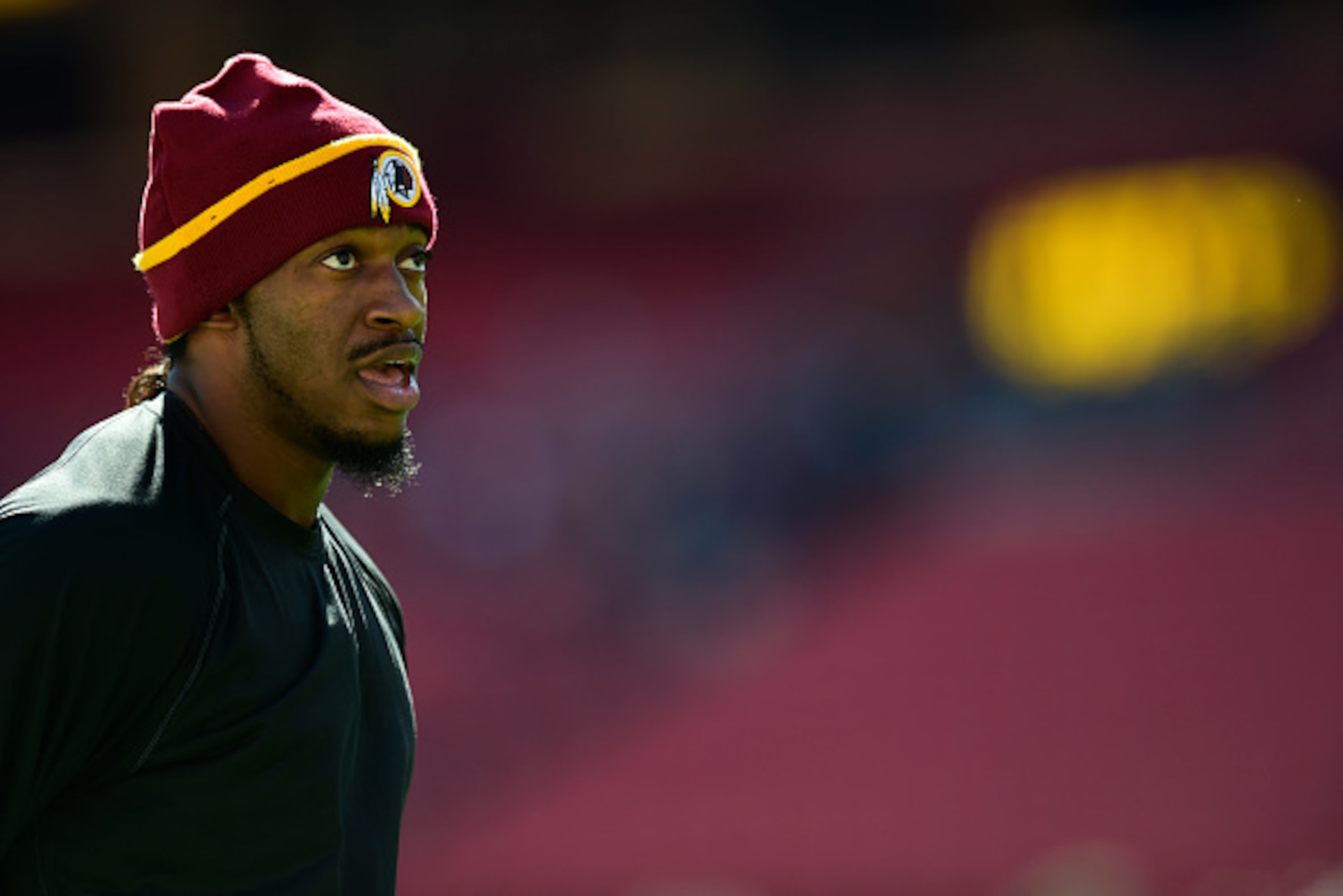 LANDOVER, MD - OCTOBER 19:  Robert Griffin III #10 of the Washington Redskins works out before their game agains the Tennessee Titans at FedExField on October 19, 2014 in Landover, Maryland.  (Photo by Patrick McDermott/Getty Images)
