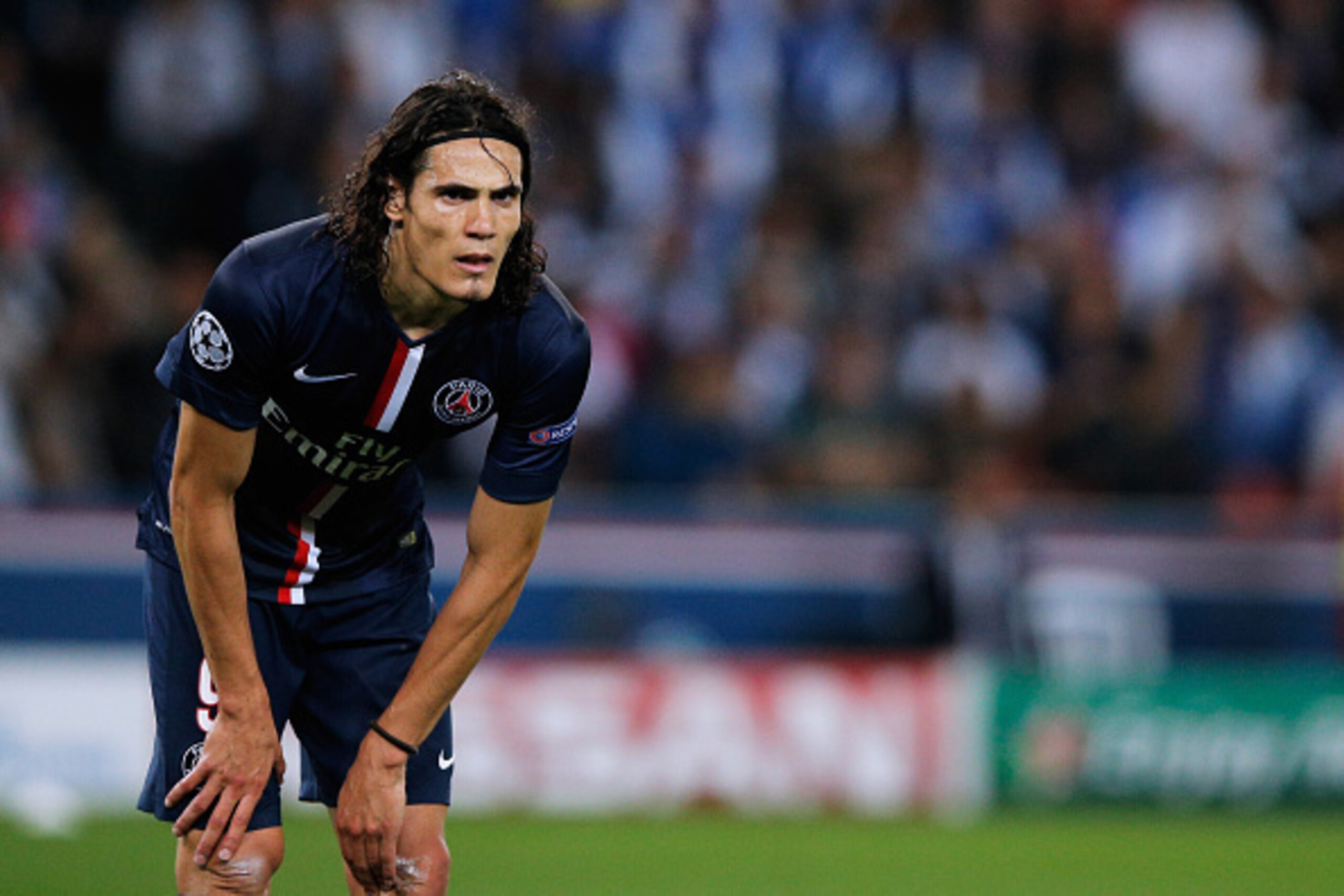PARIS, FRANCE - SEPTEMBER 30:  Edinson Cavani of PSG waits for a corner to be taken during the Group F UEFA Champions League match between Paris Saint-Germain v FC Barcelona held at Parc des Princes on September 30, 2014 in Paris, France.  (Photo by Dean 