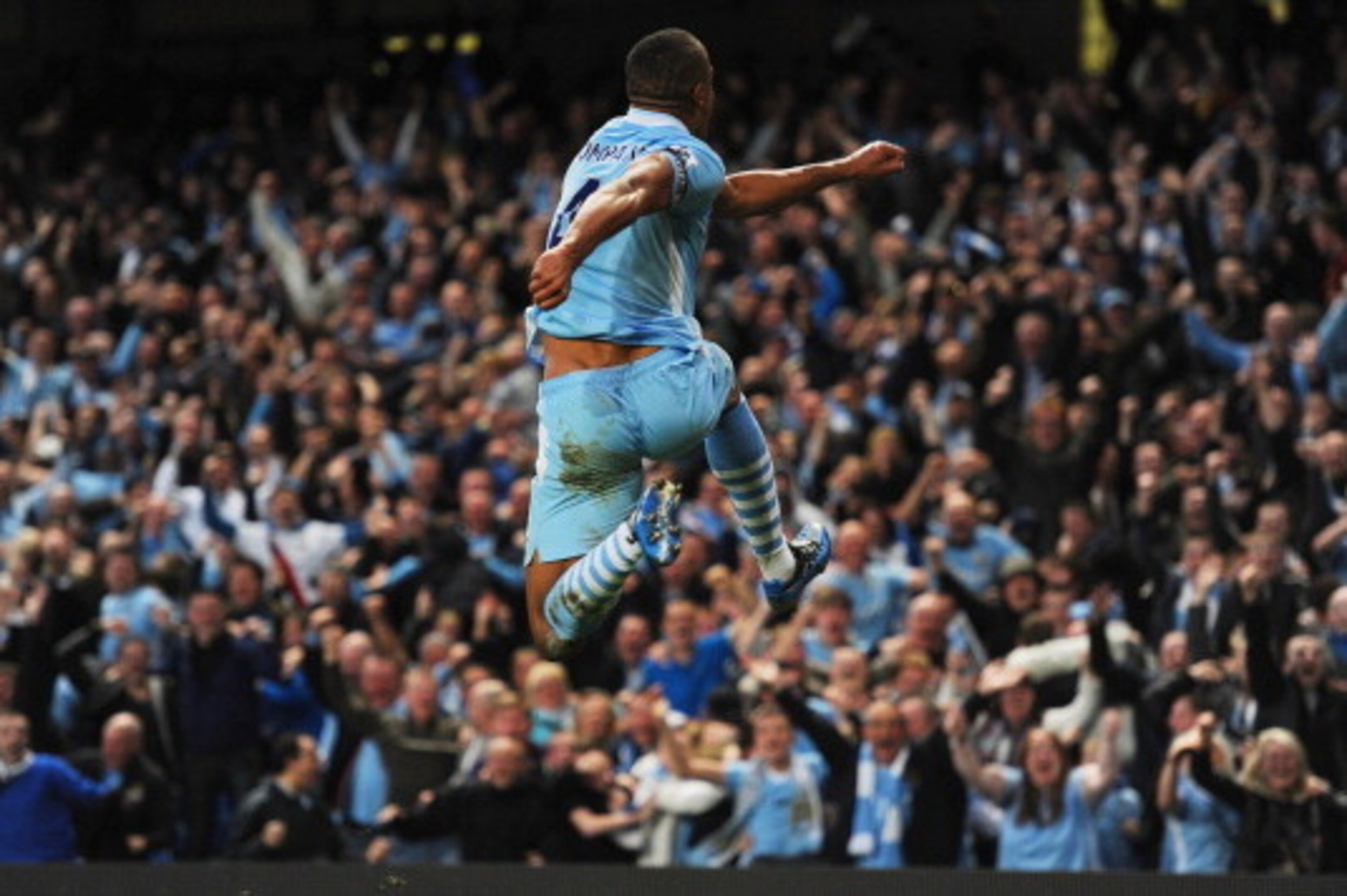 MANCHESTER, ENGLAND - APRIL 30: Vincent Kompany of Manchester City celebrates scoring to make it 1-0 during the Barclays Premier League match between Manchester City and Manchester United at Etihad Stadium on April 30, 2012 in Manchester, England. (Photo MANCHESTER, ENGLAND - APRIL 30: Vincent Kompany of Manchester City celebrates scoring to make it 1-0 during the Barclays Premier League match between Manchester City and Manchester United at Etihad Stadium on April 30, 2012 in Manchester, England. (Photo