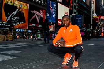 NEW YORK, NY - OCTOBER 30: Geoffrey Mutai poses for a picture at Times Square on October 30, 2014 in New York City. (Photo by Alex Goodlett/Getty Images for adidas)