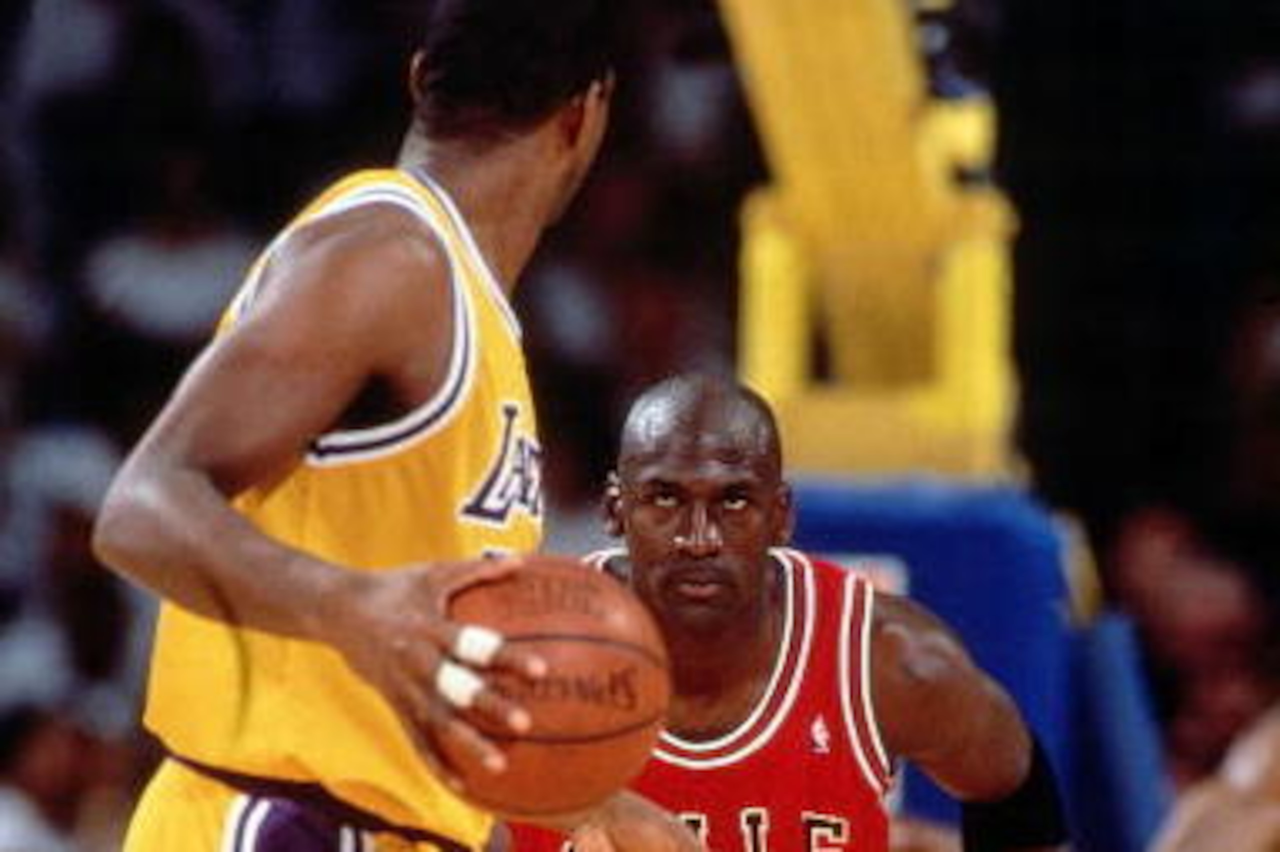 INGLEWOOD, CA - JUNE 12:  Michael Jordan #23 of the Chicago Bulls defends against Magic Johnson #32 of the Los Angeles Lakers during Game 5 of the 1991 NBA Championship Finals on June 12, 1991 at the Great Western Forum in Inglewood, California.  NOTE TO 