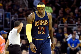 CLEVELAND, OH - OCTOBER 30:  LeBron James #23 of the Cleveland Cavaliers looks on after a play in the second quarter against the New York Knicks at Quicken Loans Arena on October 30, 2014 in Cleveland, Ohio. NOTE TO USER: User expressly acknowledges and a