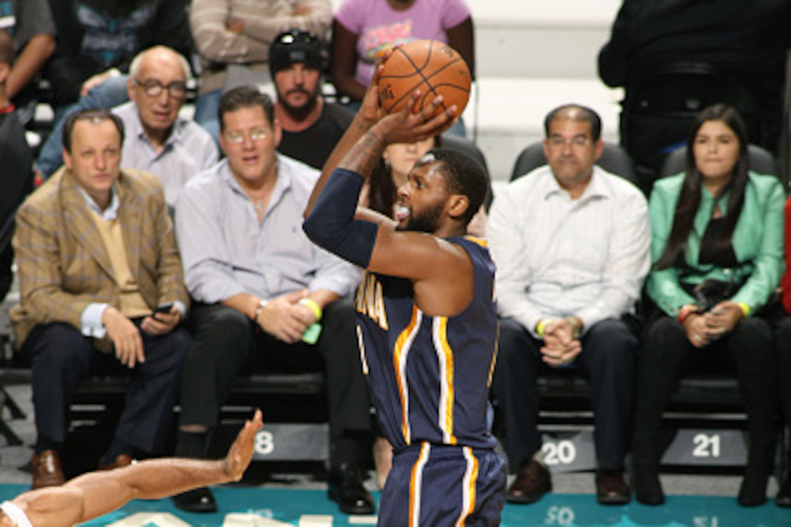 CHARLOTTE, NC - OCTOBER 23: C.J. Miles #0 of the Indiana Pacers shoots against the Charlotte Hornets during the game at the Time Warner Cable Arena on October 23, 2014 in Charlotte, North Carolina. NOTE TO USER: User expressly acknowledges and agrees that