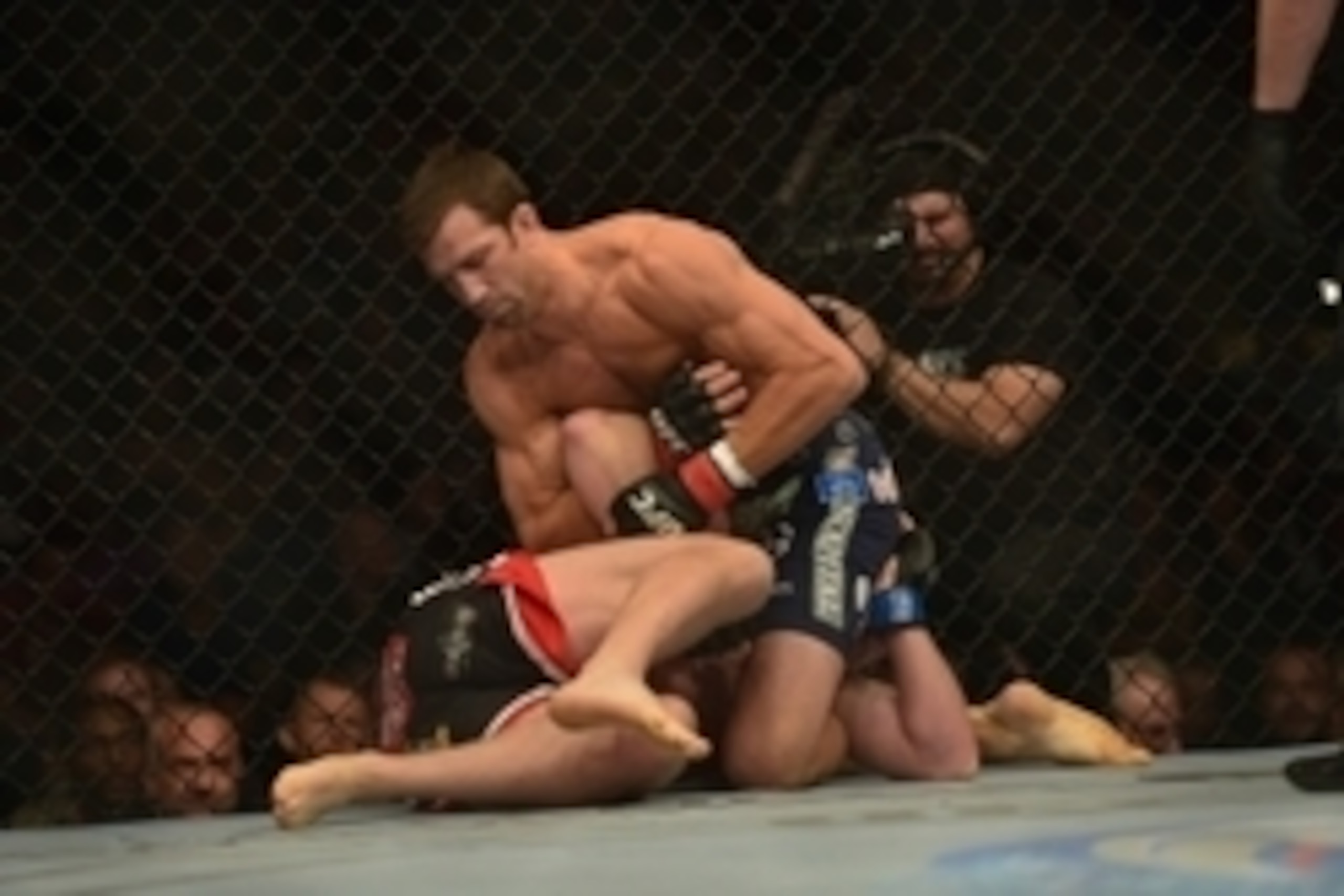 Apr 26, 2014; Baltimore, MD, USA;  Luke Rockhold (top) Tim Boetschat grapple during the first round at Baltimore Arena. Rockhold defeated Boetsch by submission in the first round Mandatory Credit: Tommy Gilligan-USA TODAY Sports