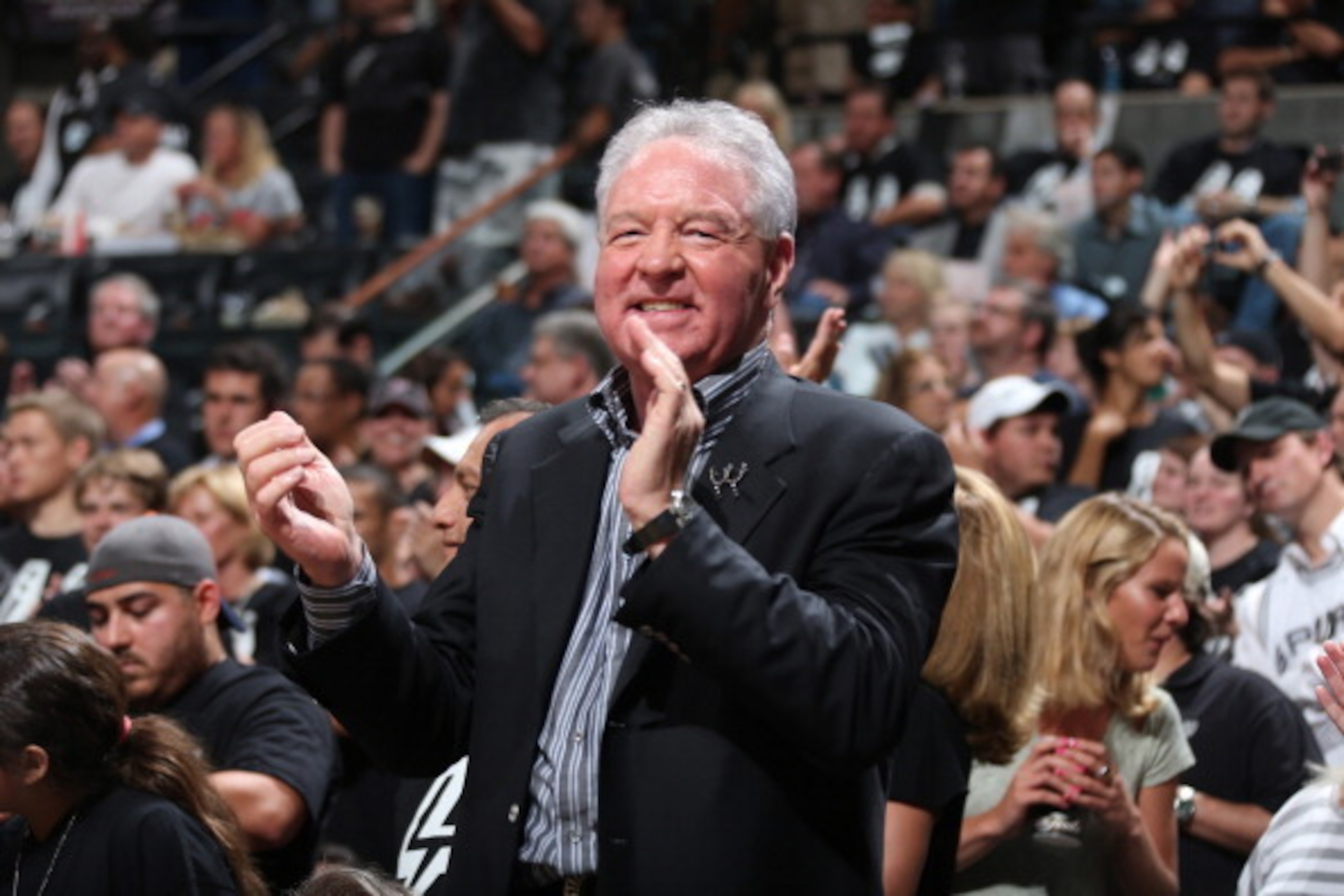 SAN ANTONIO, TX - JUNE 11:  Peter Holt the owner of the San Antonio Spurs cheers as the Spurs lead the Miami Heat during Game Three of the 2013 NBA Finals on June 11, 2013 at the AT&T Center in San Antonio, Texas. NOTE TO USER: User expressly acknowledges