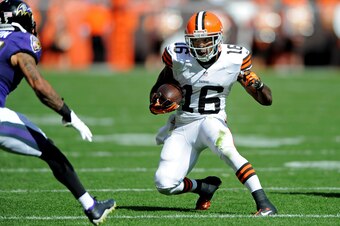 Sep 21, 2014; Cleveland, OH, USA; Cleveland Browns wide receiver Andrew Hawkins (16) runs after a catch during the third quarter against the Baltimore Ravens at FirstEnergy Stadium. The Ravens won 23-21. Mandatory Credit: Ken Blaze-USA TODAY Sports
