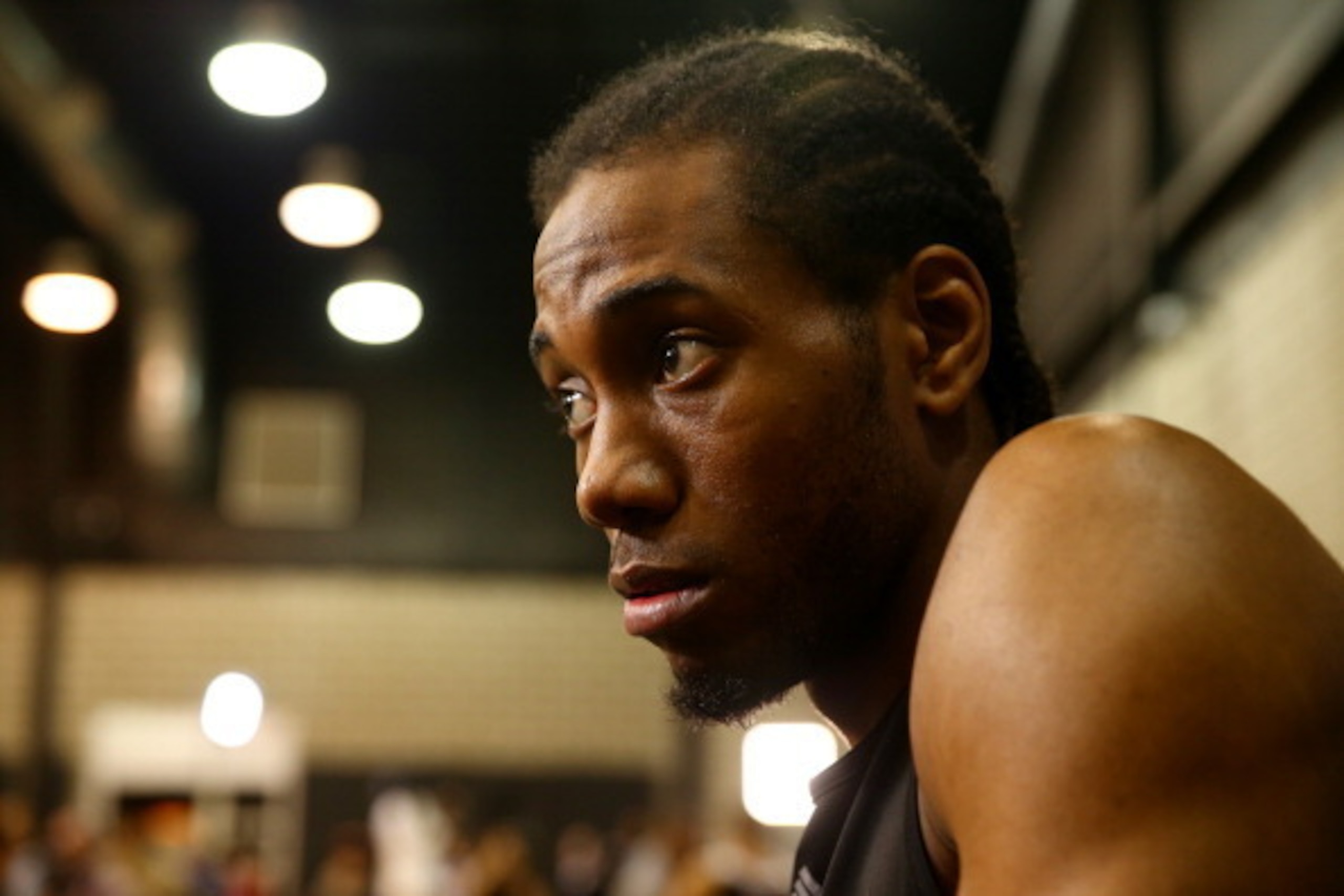 SAN ANTONIO, TX - JUNE 14:  Kawhi Leonard #2 of the San Antonio Spurs speaks to the media on an off day following Game Four of the 2014 NBA Finals against the Miami Heat at the Spurs Practice Facility on June 14, 2014 in San Antonio, Texas. NOTE TO USER: 