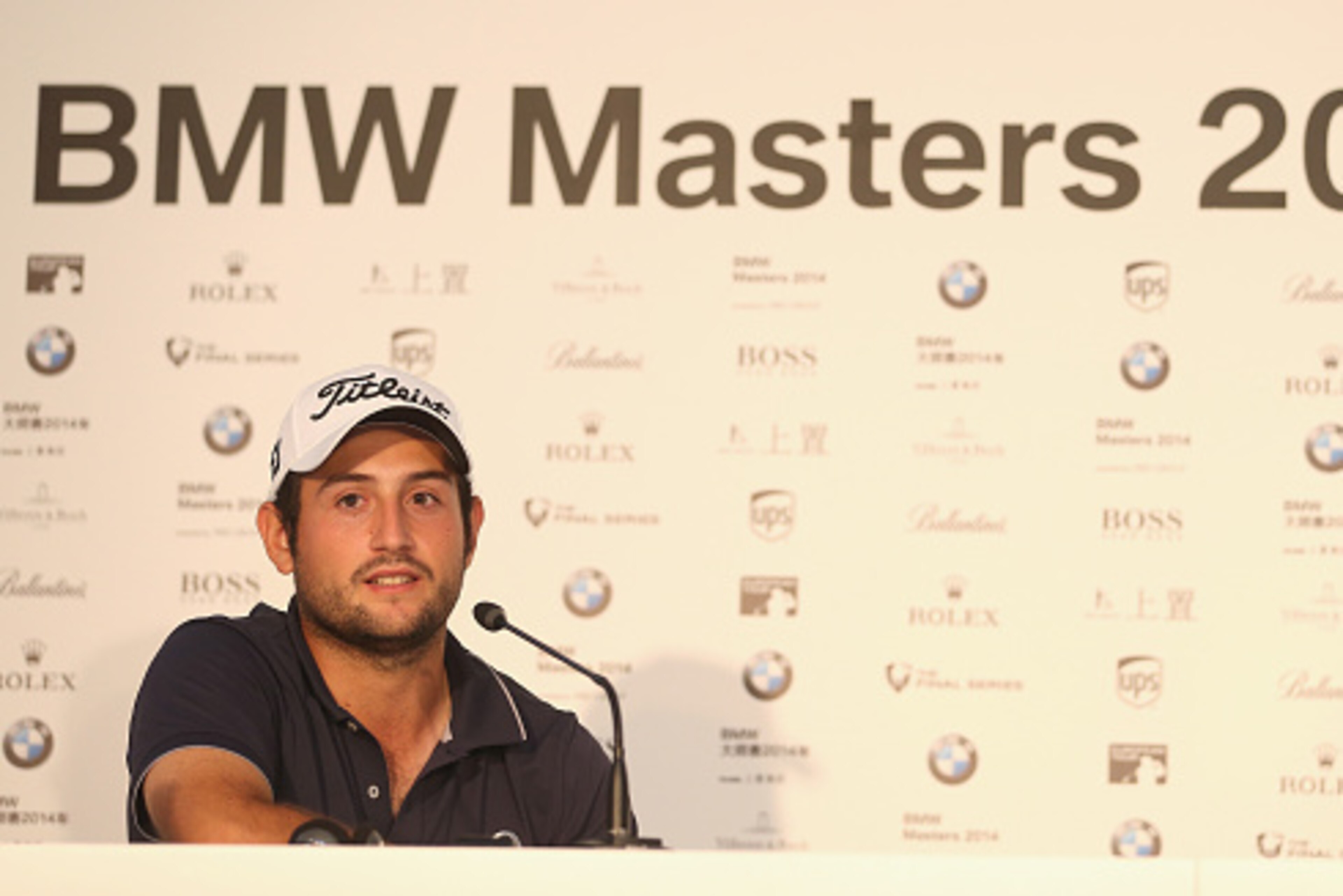 SHANGHAI, CHINA - NOVEMBER 01:  Alexander Levy of France talks to the media during a press conference following the third round of the BMW Masters at Lake Malaren Golf Club on November 1, 2014 in Shanghai, China.  (Photo by Andrew Redington/Getty Images)