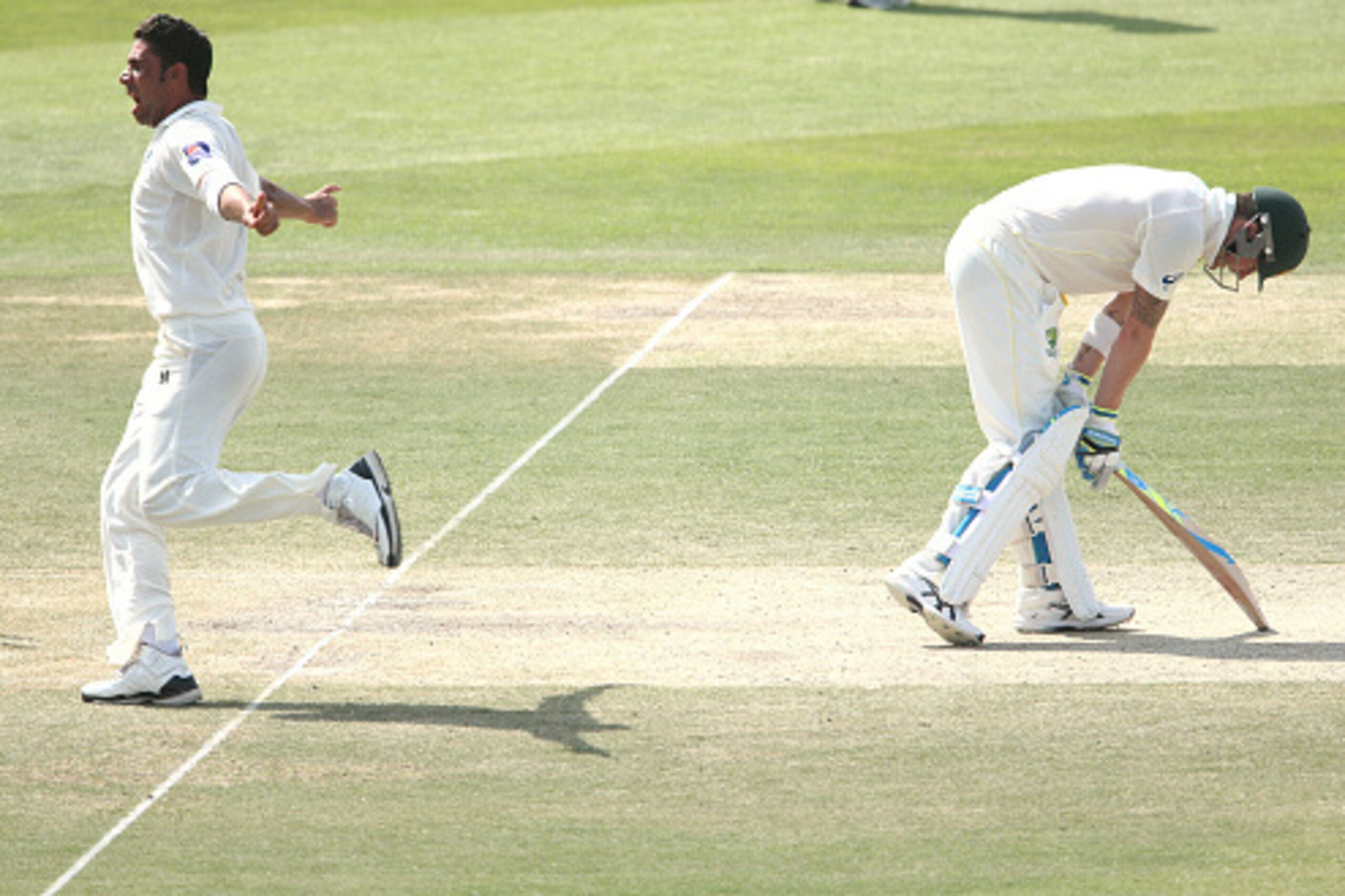 ABU DHABI, UNITED ARAB EMIRATES - NOVEMBER 01:  Imran Khan of Paksitan celebrates after bowling Michael Clarke of Australia during Day Three of the Second Test between Pakistan and Australia at Sheikh Zayed Stadium on November 1, 2014 in Abu Dhabi, United