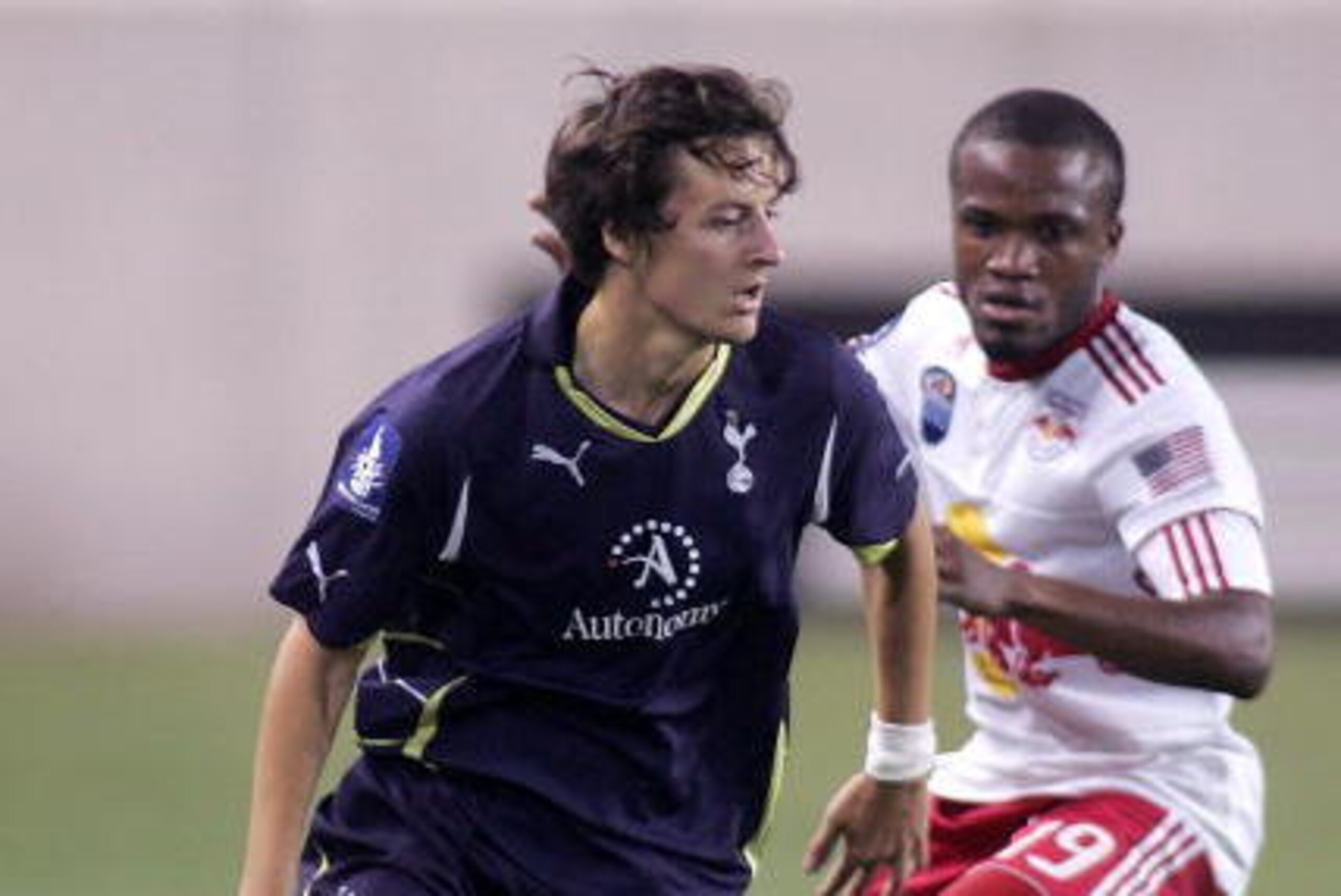 HARRISON, NJ - JULY 22: Dane Richards #19 of the New York Red Bulls and Ryan Mason #33 of Tottenham Hotspur pursue a loose ball during their game at Red Bull Arena on July 22, 2010 in Harrison, New Jersey. (Photo by Andy Marlin/Getty Images for the New Yo