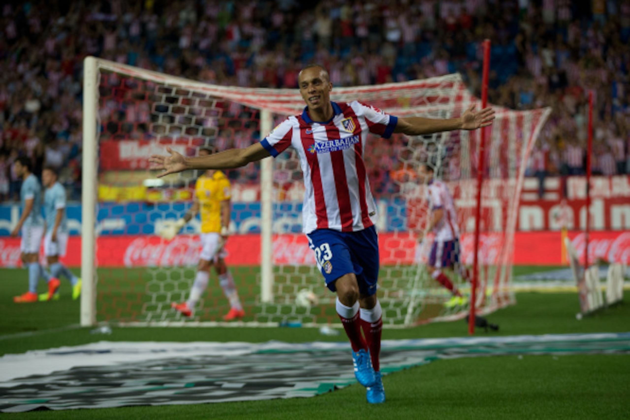 MADRID, SPAIN - AUGUST 30:Joao Miranda of Atletico de Madrid celebrates scoring their opening goal during the La Liga match between Club Atletico de Madrid and SD Eibar at Vicente Calderon Stadium on August 30, 2014 in Madrid, Spain.  (Photo by Gonzalo Ar