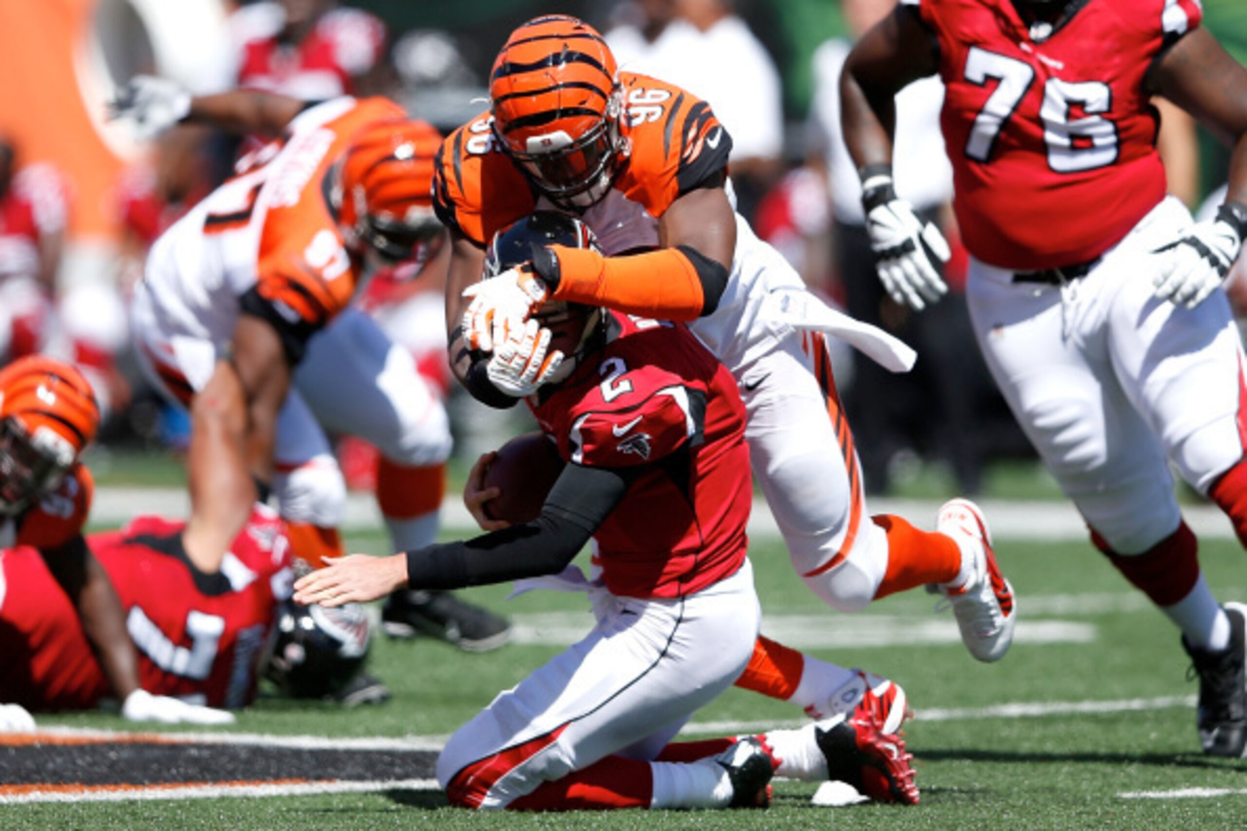 CINCINNATI, OH - SEPTEMBER 14:  Carlos Dunlap #96 of the Cincinnati Bengals sacks Matt Ryan #2 of the Atlanta Falcons during the second quarter at Paul Brown Stadium on September 14, 2014 in Cincinnati, Ohio. (Photo by Joe Robbins/Getty Images)
