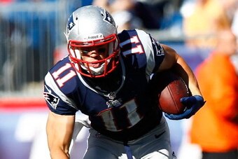 FOXBORO, PA - SEPTEMBER 16:  Julian Edelman #11 of the New England Patriots runs with the ball against the Arizona Cardinals during the game on September 16, 2012 at Gillette Stadium in Foxboro, Massachusetts.  (Photo by Jared Wickerham/Getty Images)