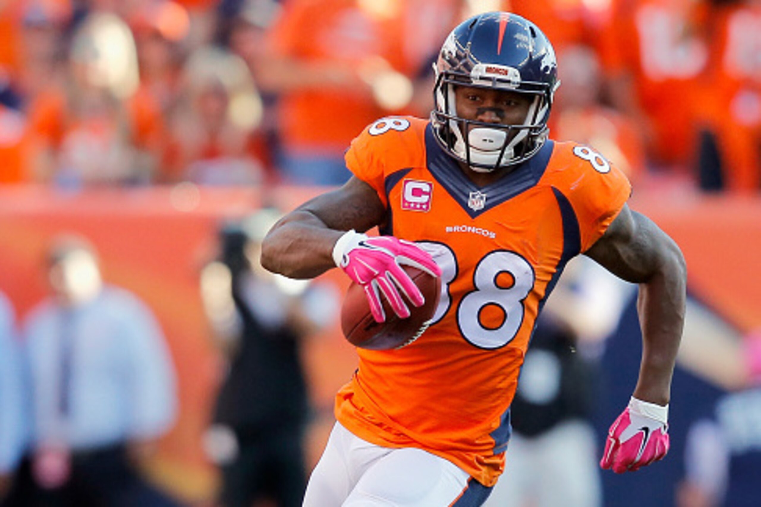 DENVER, CO - OCTOBER 05:  Wide receiver Demaryius Thomas #88 of the Denver Broncos makes a pass reception against the Arizona Cardinals at Sports Authority Field at Mile High on October 5, 2014 in Denver, Colorado. The Broncos defeated the Cardinals 41-20