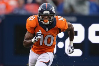 DENVER, CO - AUGUST 07:  Wide receiver Emmanuel Sanders #10 of the Denver Broncos leaves the line of scrimmage against the Seattle Seahawks during preseason action at Sports Authority Field at Mile High on August 7, 2014 in Denver, Colorado. The Broncos d