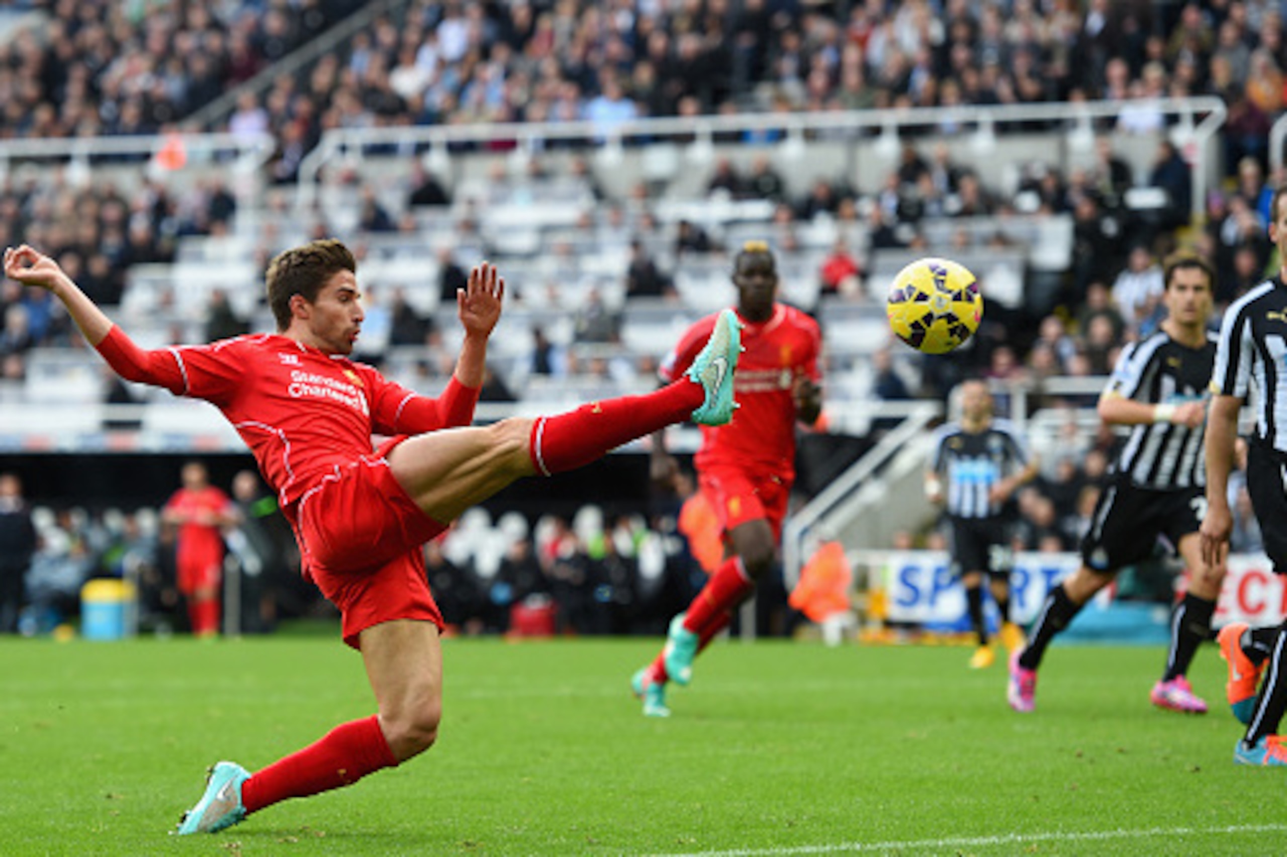 NEWCASTLE UPON TYNE, ENGLAND - NOVEMBER 01:  Liverpool player Fabio Borini in action during the Barclays Premier League match between Newcastle United and Liverpool at St James' Park on November 1, 2014 in Newcastle upon Tyne, England.  (Photo by Stu Fors