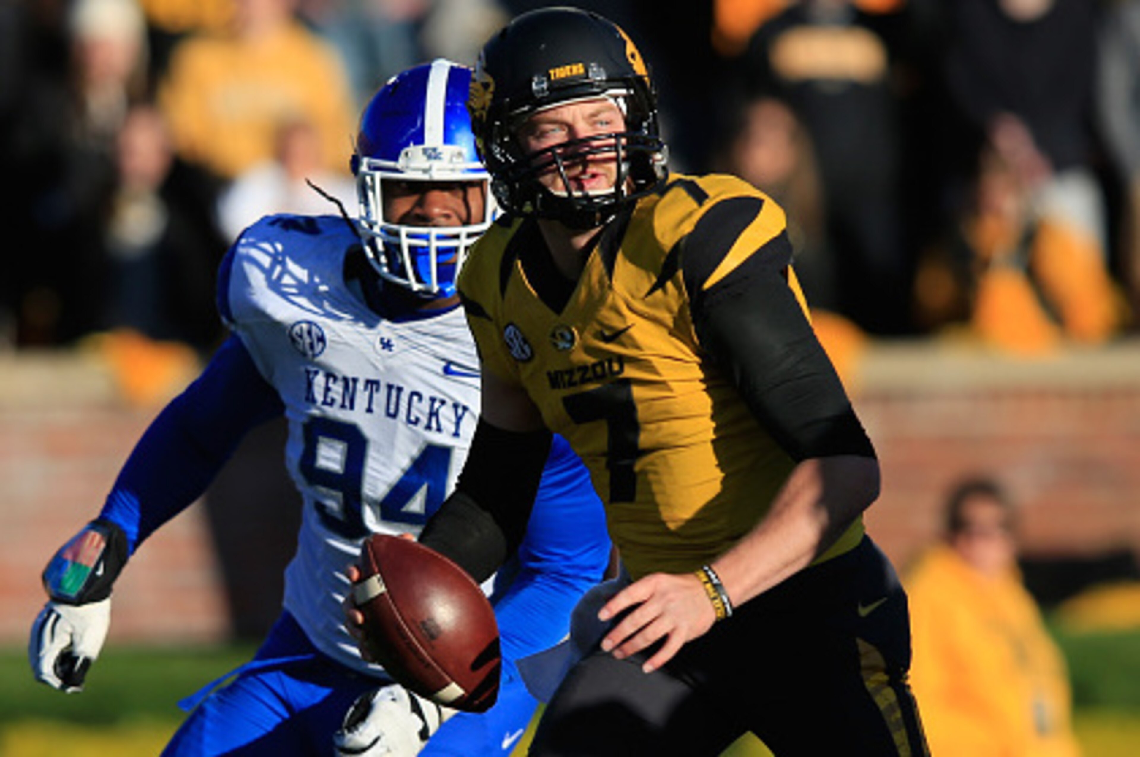 COLUMBIA, MO - NOVEMBER 01:  Quarterback Maty Mauk #7 of the Missouri Tigers is looks to pass as he is persued by Za'Darius Smith #94 of the Kentucky Wildcats during the second half of the game at Faurot Field/Memorial Stadium on November 1, 2014 in Colum