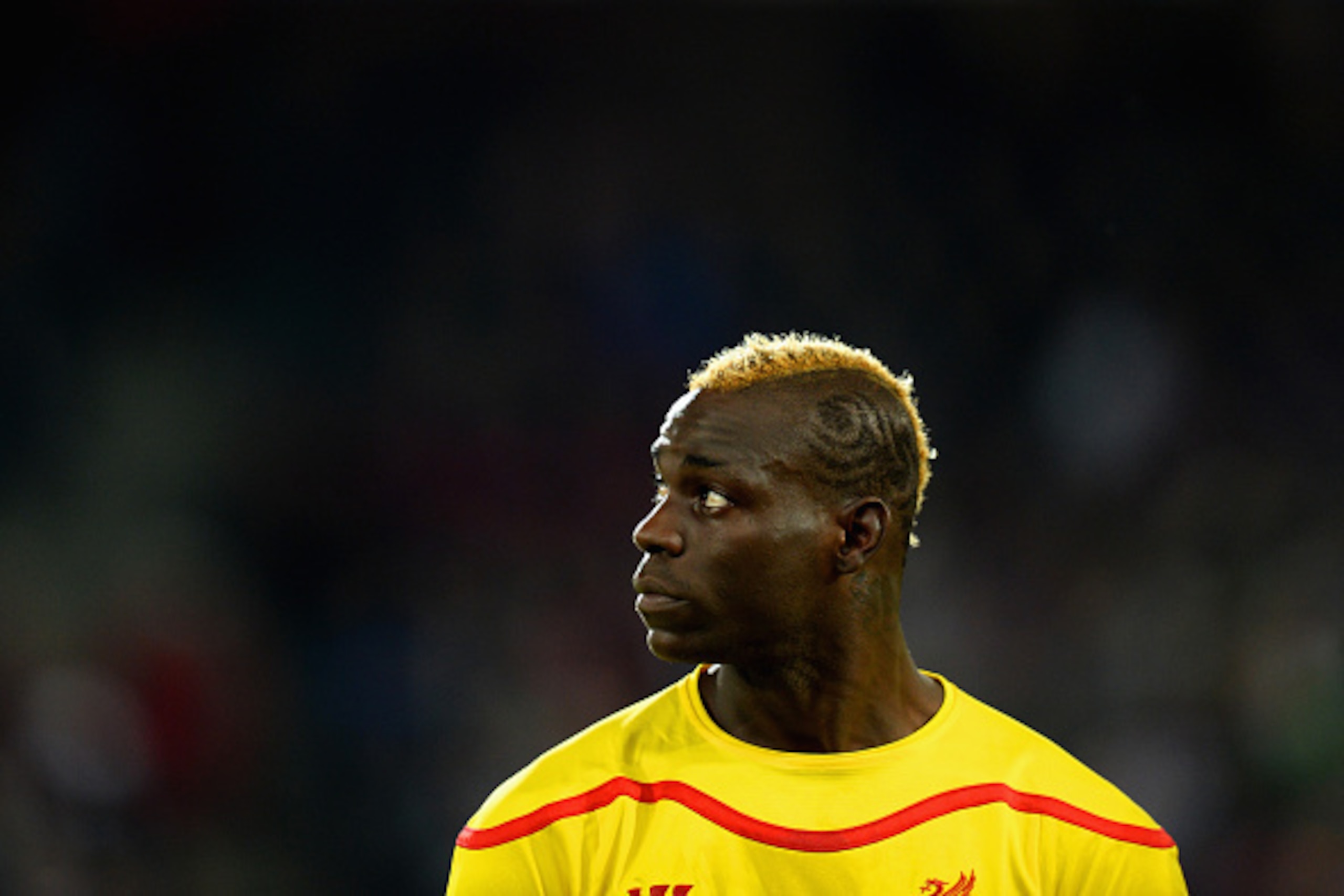 BASEL, SWITZERLAND - OCTOBER 01:  Mario Balotelli of Liverpool looks on during the UEFA Champions League Group B match between FC Basel 1893 and Liverpool FC at St. Jakob Stadium on October 1, 2014 in Basel, Switzerland.  (Photo by Jamie McDonald/Getty Im