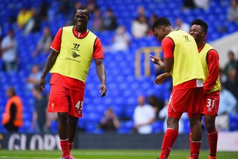 LONDON, ENGLAND - AUGUST 31:  Mario Balotelli shares a joke with Daniel Sturridge and Raheem Sterling of Liverpool during the Barclays Premier League match between Tottenham Hotspur and Liverpool at White Hart Lane on August 31, 2014 in London, England.  