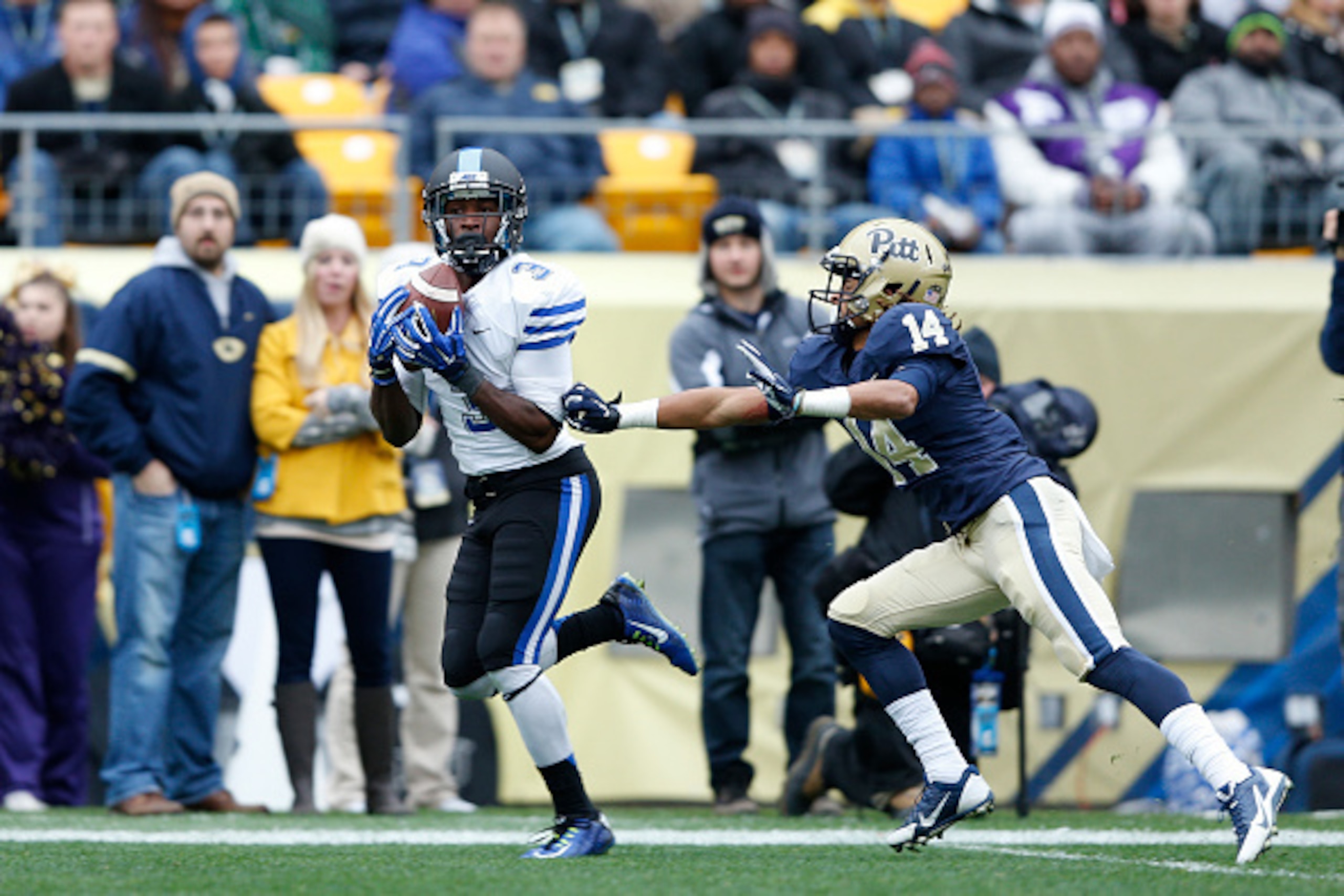PITTSBURGH, PA - NOVEMBER 1: Jamison Crowder #3 of the Duke Blue Devils makes a 39-yard touchdown reception against Avonte Maddox #14 of the Pittsburgh Panthers in the first quarter of the game at Heinz Field on November 1, 2014 in Pittsburgh, Pennsylvani PITTSBURGH, PA - NOVEMBER 1: Jamison Crowder #3 of the Duke Blue Devils makes a 39-yard touchdown reception against Avonte Maddox #14 of the Pittsburgh Panthers in the first quarter of the game at Heinz Field on November 1, 2014 in Pittsburgh, Pennsylvani