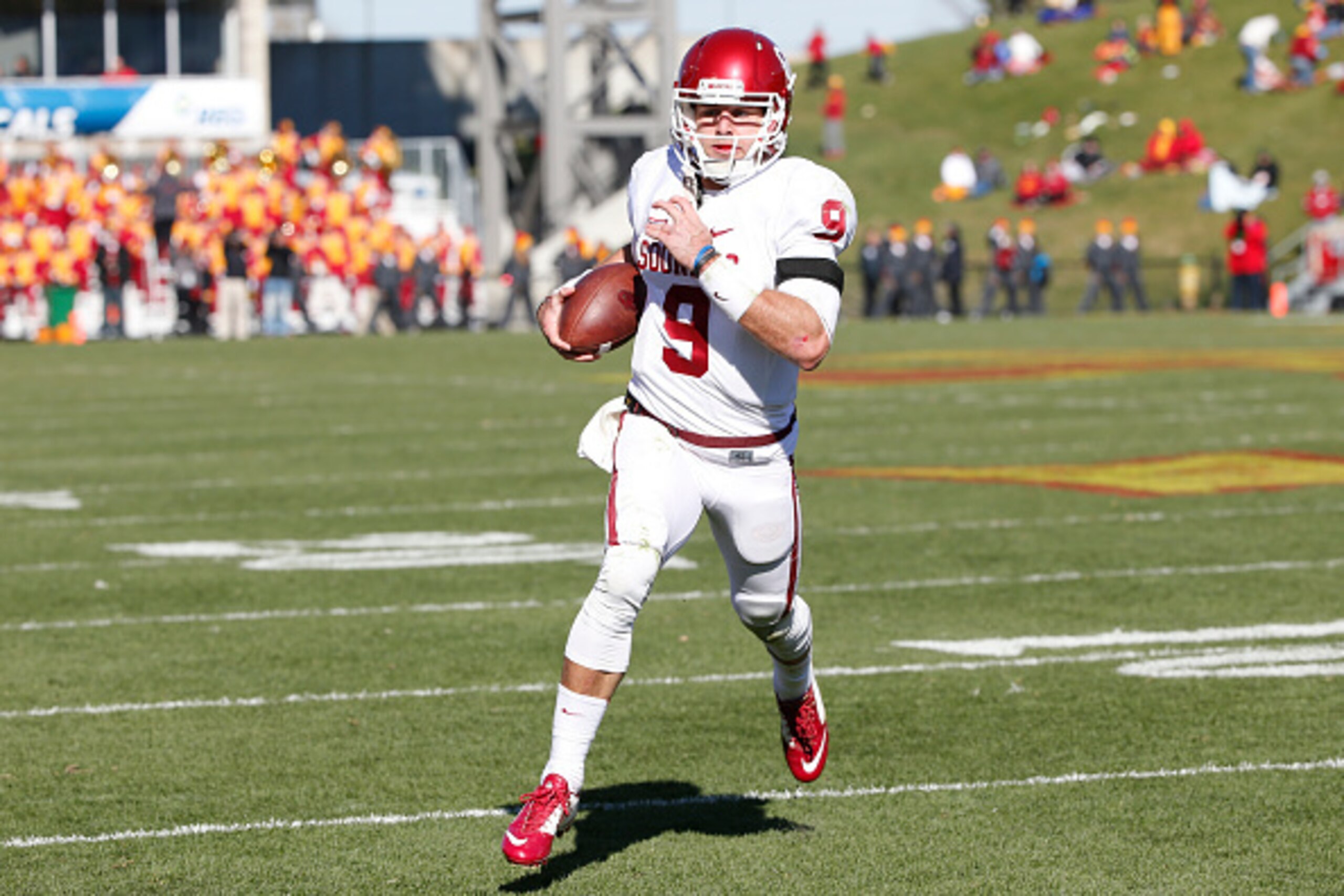 AMES, IA - NOVEMBER 1: Quarterback Trevor Knight #9 of the Oklahoma Sooners runs the ball into the end zone to score a touchdown in the second half of play against the Iowa State Cyclones at Jack Trice Stadium on November 1, 2014 in Ames, Iowa. The Oklah AMES, IA - NOVEMBER 1: Quarterback Trevor Knight #9 of the Oklahoma Sooners runs the ball into the end zone to score a touchdown in the second half of play against the Iowa State Cyclones at Jack Trice Stadium on November 1, 2014 in Ames, Iowa. The Oklah