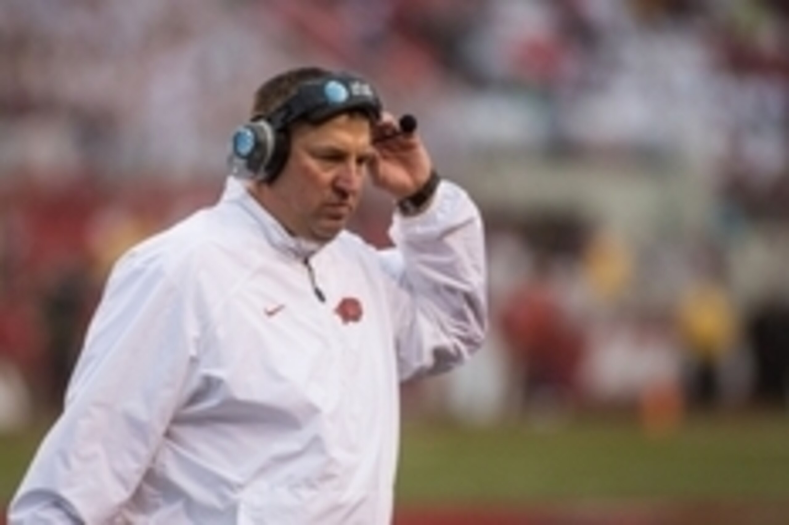Oct 11, 2014; Fayetteville, AR, USA; Arkansas Razorbacks head coach Bret Bielema adjust his headset during a game against the Alabama Crimson Tide at Donald W. Reynolds Razorback Stadium. Alabama defeated Arkansas 14-13. Mandatory Credit: Beth Hall-USA TO