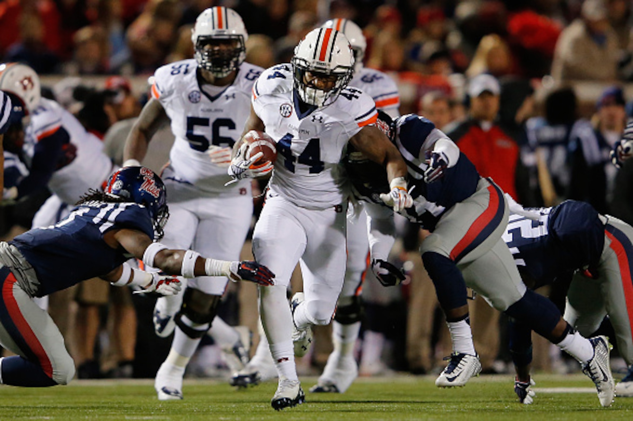 OXFORD, MS - NOVEMBER 01: Cameron Artis-Payne #44 of the Auburn Tigers carries the ball against the Mississippi Rebels at Vaught-Hemingway Stadium on November 1, 2014 in Oxford, Mississippi. (Photo by Doug Pensinger/Getty Images) OXFORD, MS - NOVEMBER 01: Cameron Artis-Payne #44 of the Auburn Tigers carries the ball against the Mississippi Rebels at Vaught-Hemingway Stadium on November 1, 2014 in Oxford, Mississippi. (Photo by Doug Pensinger/Getty Images)