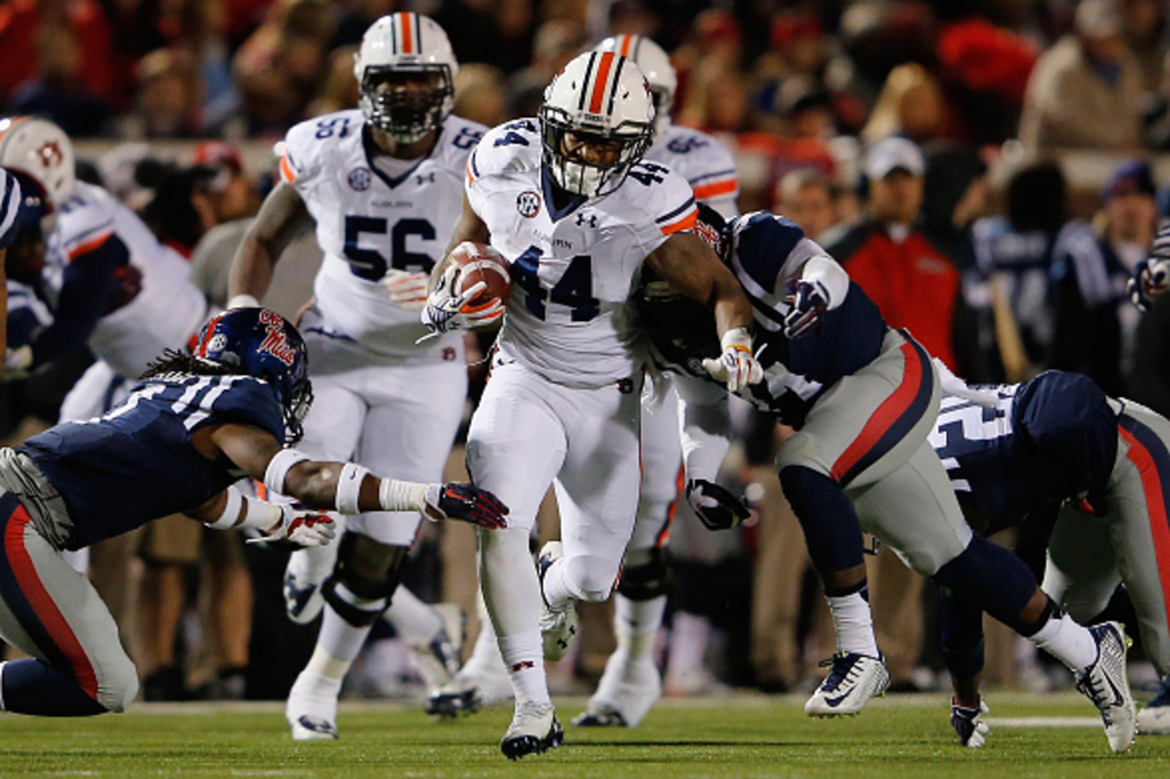 OXFORD, MS - NOVEMBER 01: Cameron Artis-Payne #44 of the Auburn Tigers carries the ball against the Mississippi Rebels at Vaught-Hemingway Stadium on November 1, 2014 in Oxford, Mississippi. (Photo by Doug Pensinger/Getty Images) OXFORD, MS - NOVEMBER 01: Cameron Artis-Payne #44 of the Auburn Tigers carries the ball against the Mississippi Rebels at Vaught-Hemingway Stadium on November 1, 2014 in Oxford, Mississippi. (Photo by Doug Pensinger/Getty Images)