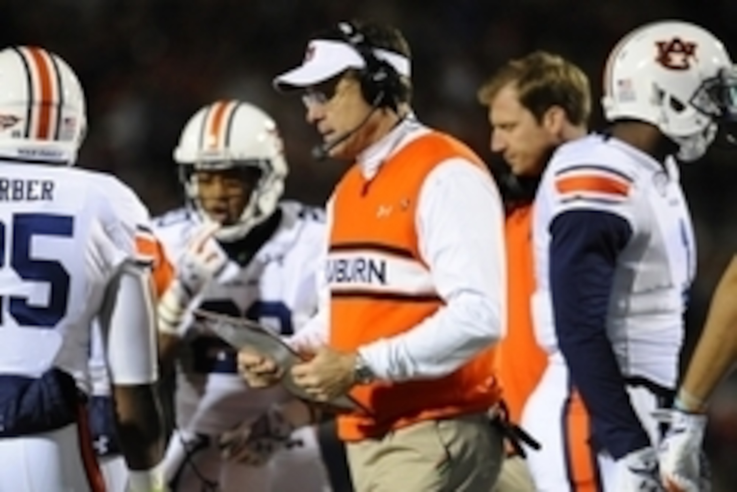 Nov 1, 2014; Oxford, MS, USA; Auburn Tigers head coach Gus Malzahn with his players on the sidelines during the third quarter against the Ole Miss Rebelsat Vaught-Hemingway Stadium. Mandatory Credit: Shanna Lockwood-USA TODAY Sports Nov 1, 2014; Oxford, MS, USA; Auburn Tigers head coach Gus Malzahn with his players on the sidelines during the third quarter against the Ole Miss Rebelsat Vaught-Hemingway Stadium. Mandatory Credit: Shanna Lockwood-USA TODAY Sports