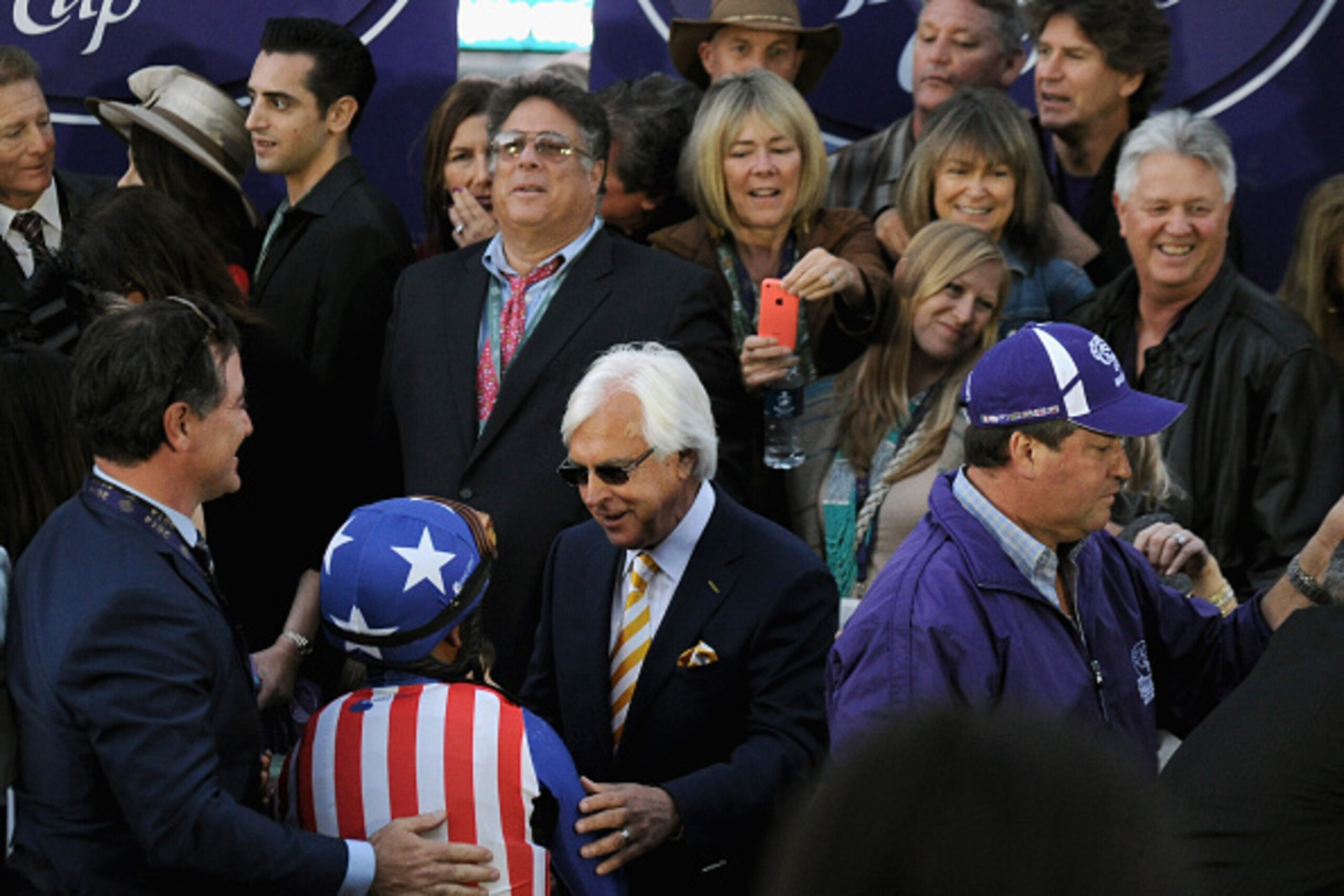 ARCADIA, CA - NOVEMBER 01: Jockey Martin Garcia is congratulated by trainer Bob Baffert (C) after winning the 2014 Breeders' Cup Classic on Bayern at Santa Anita Park on November 1, 2014 in Arcadia, California. (Photo by Harry How/Getty Images) ARCADIA, CA - NOVEMBER 01: Jockey Martin Garcia is congratulated by trainer Bob Baffert (C) after winning the 2014 Breeders' Cup Classic on Bayern at Santa Anita Park on November 1, 2014 in Arcadia, California. (Photo by Harry How/Getty Images)