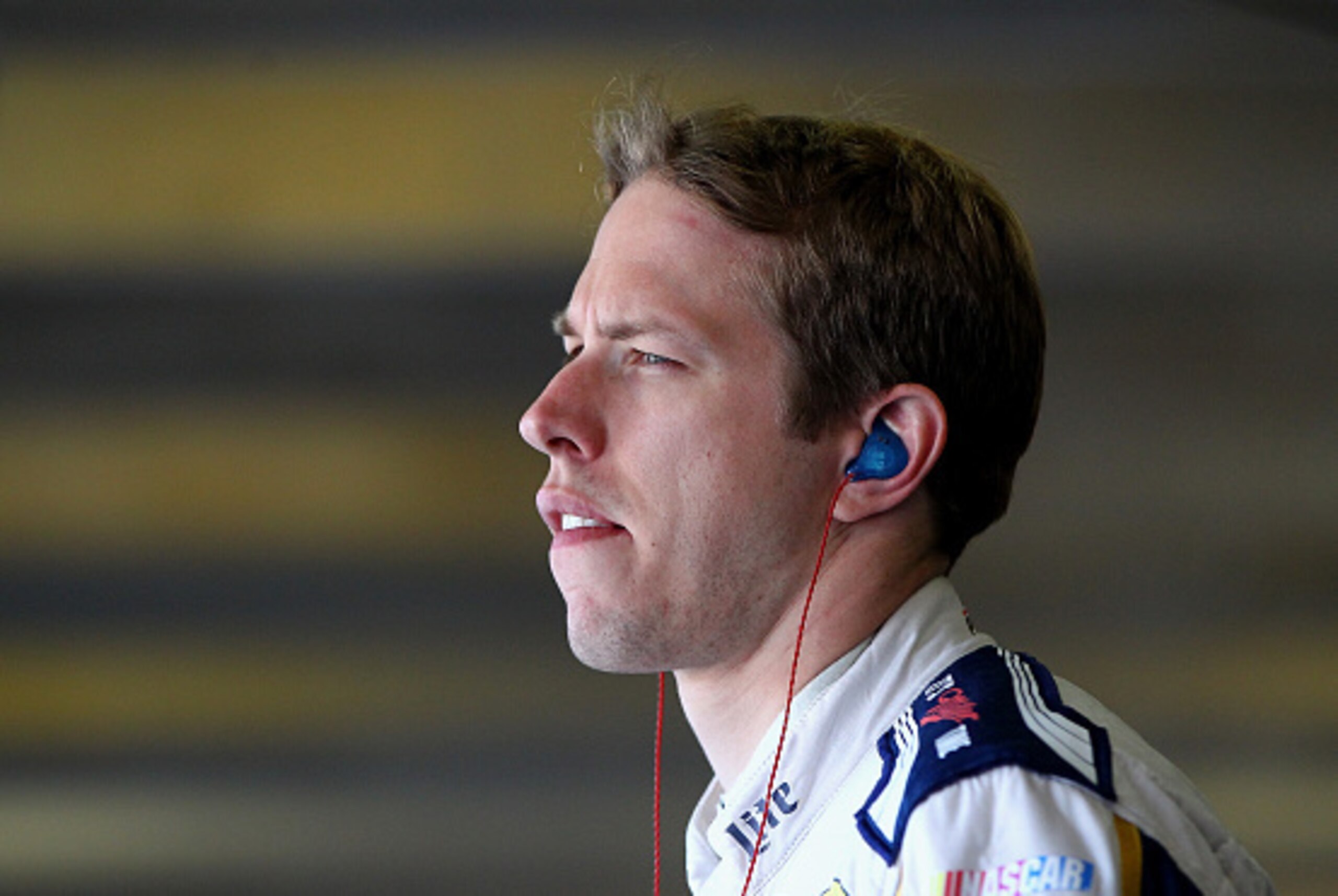 FORT WORTH, TX - NOVEMBER 01:  Brad Keselowski, driver of the #2 Miller Lite Ford, stands in the garage area during practice for the NASCAR Sprint Cup Series AAA Texas 500 at Texas Motor Speedway on November 1, 2014 in Fort Worth, Texas.  (Photo by Jonath