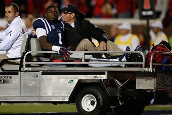 OXFORD, MS - NOVEMBER 01:  Laquon Treadwell #1 of the Mississippi Rebels is taken from the field after being injured late in the fourth quarter against the Auburn Tigers at Vaught-Hemingway Stadium on November 1, 2014 in Oxford, Mississippi. Auburn defeat