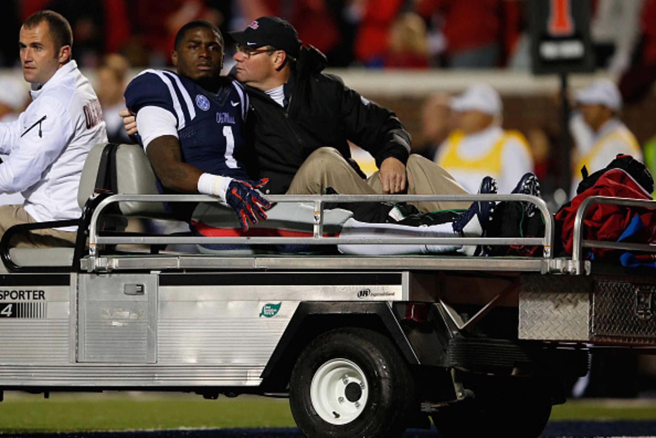 OXFORD, MS - NOVEMBER 01:  Laquon Treadwell #1 of the Mississippi Rebels is taken from the field after being injured late in the fourth quarter against the Auburn Tigers at Vaught-Hemingway Stadium on November 1, 2014 in Oxford, Mississippi. Auburn defeat