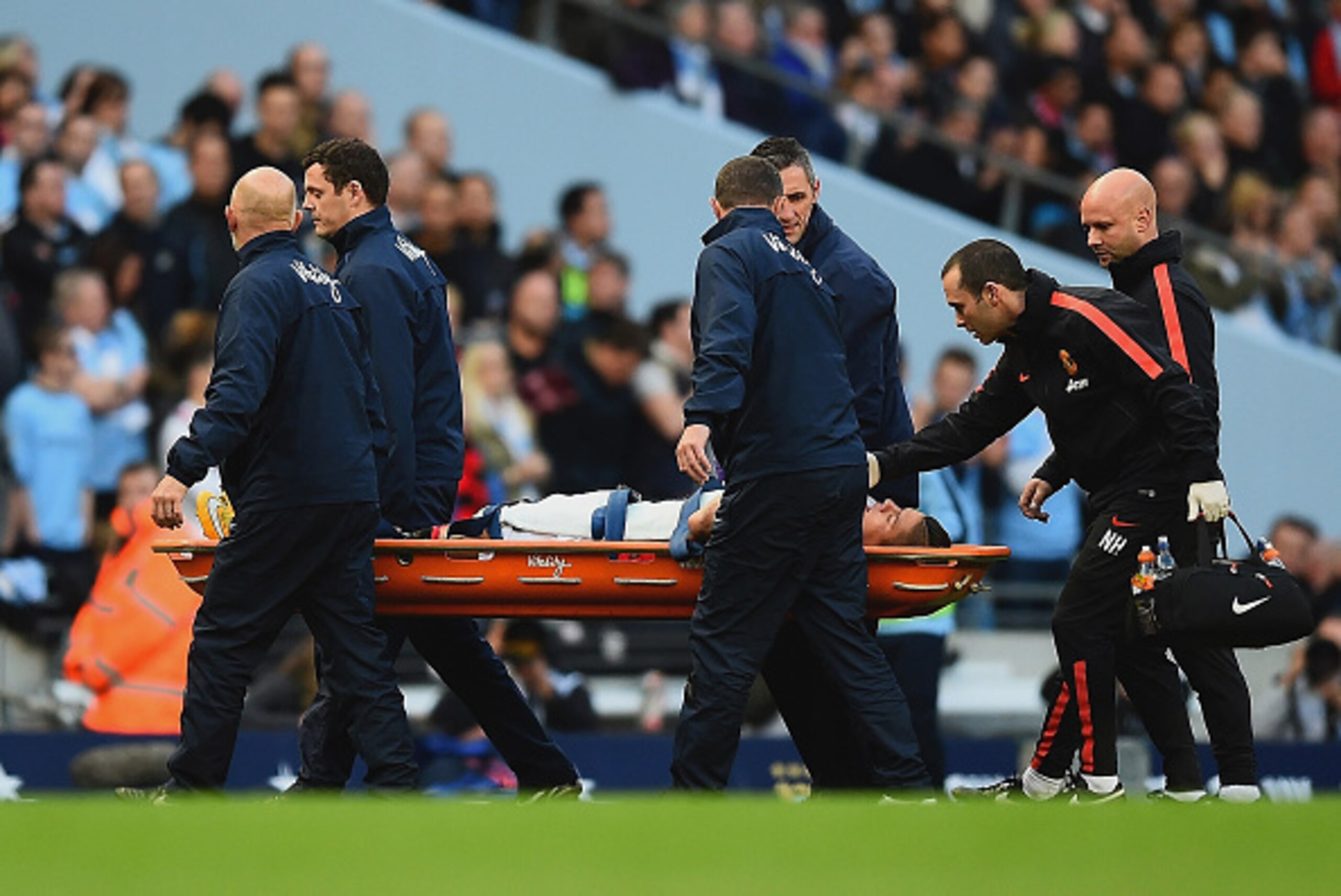 MANCHESTER, ENGLAND - NOVEMBER 02:  Marcos Rojo of Manchester United is stretchered off during the Barclays Premier League match between Manchester City and Manchester United at Etihad Stadium on November 2, 2014 in Manchester, England.  (Photo by Laurenc