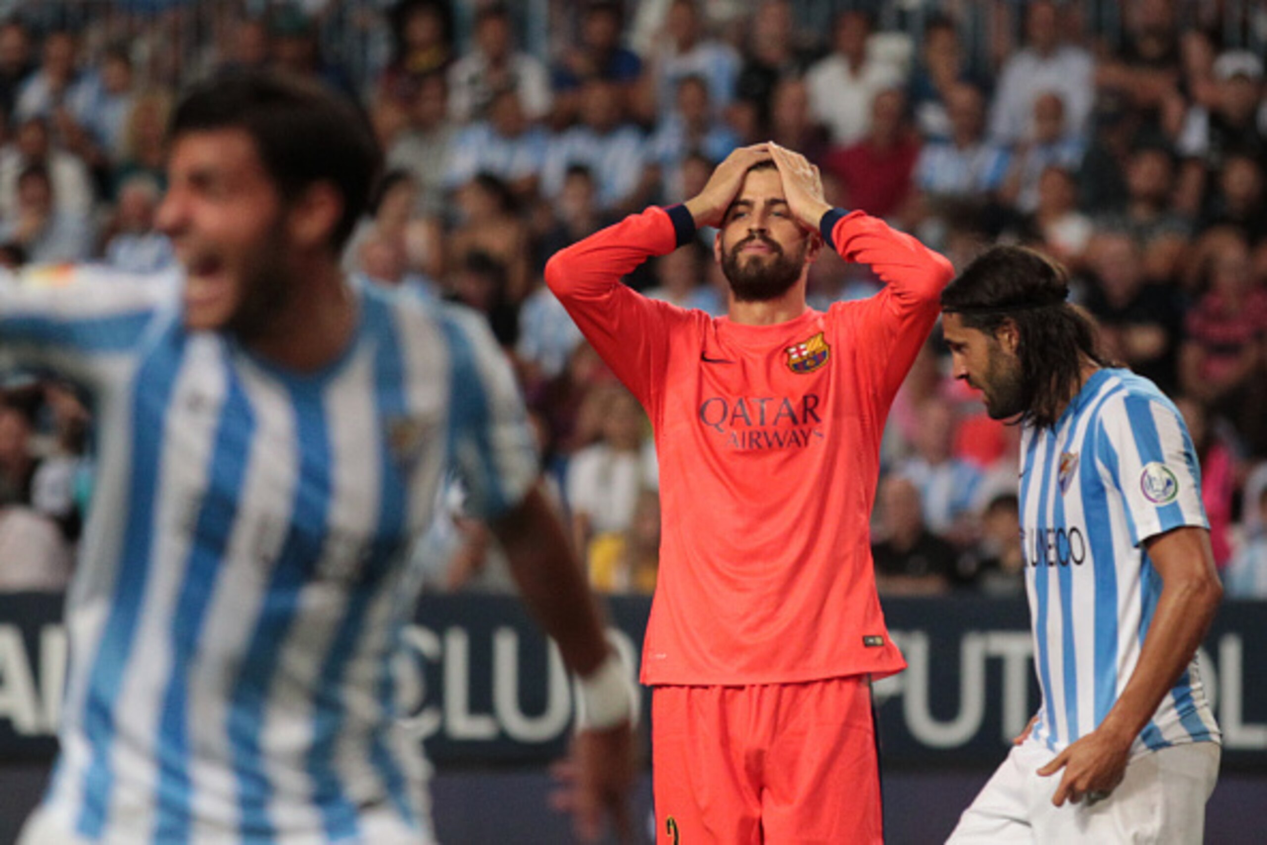 MALAGA, SPAIN - SEPTEMBER 24: Gerard Pique of F.C. Barcelona reacts during the La Liga match between Malaga CF and FC Barcelona at La Rosaleda studium on September 24, 2014 in Malaga, Spain. (Photo by Sergio Camacho/Getty Images) MALAGA, SPAIN - SEPTEMBER 24: Gerard Pique of F.C. Barcelona reacts during the La Liga match between Malaga CF and FC Barcelona at La Rosaleda studium on September 24, 2014 in Malaga, Spain. (Photo by Sergio Camacho/Getty Images)