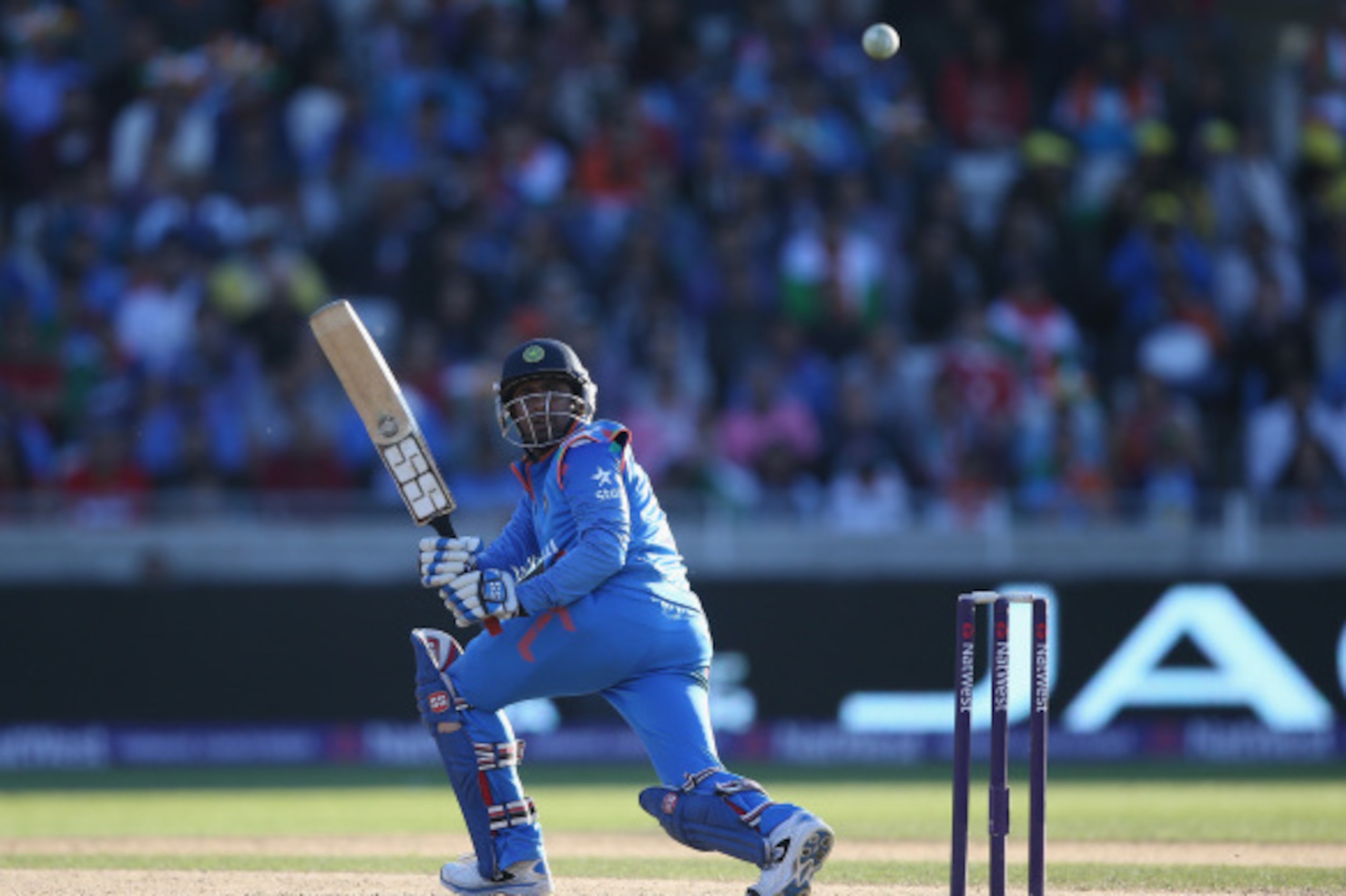 BIRMINGHAM, ENGLAND - SEPTEMBER 07:  Suresh Raina of India in action during the NatWest International T20 2014 match between England and India at Edgbaston on September 7, 2014 in Birmingham, England.  (Photo by Clive Mason/Getty Images)