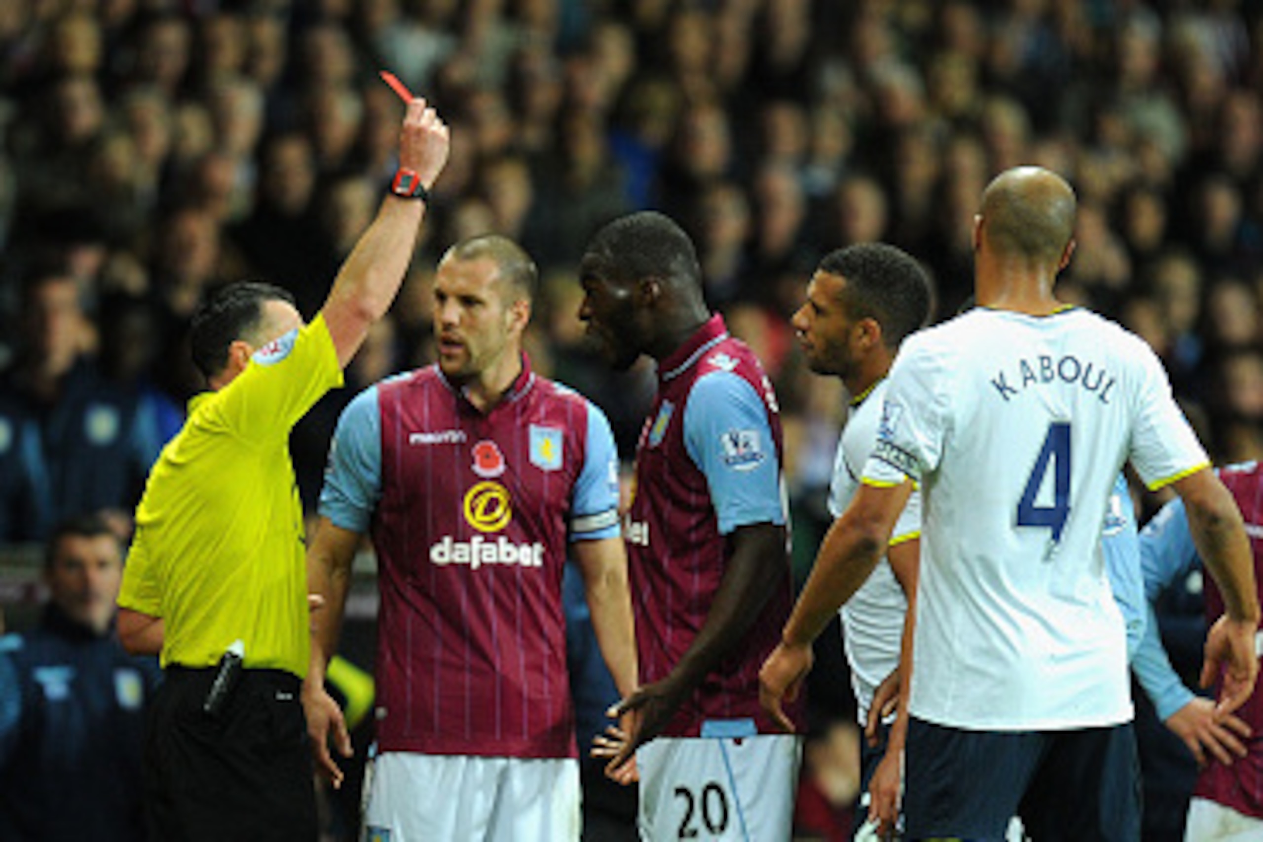 BIRMINGHAM, ENGLAND - NOVEMBER 02:  Villa player Christian Benteke (c) is sent off during the Barclays Premier League match between Aston Villa and Tottenham Hotspur at Villa Park on November 2, 2014 in Birmingham, England.  (Photo by Stu Forster/Getty Im