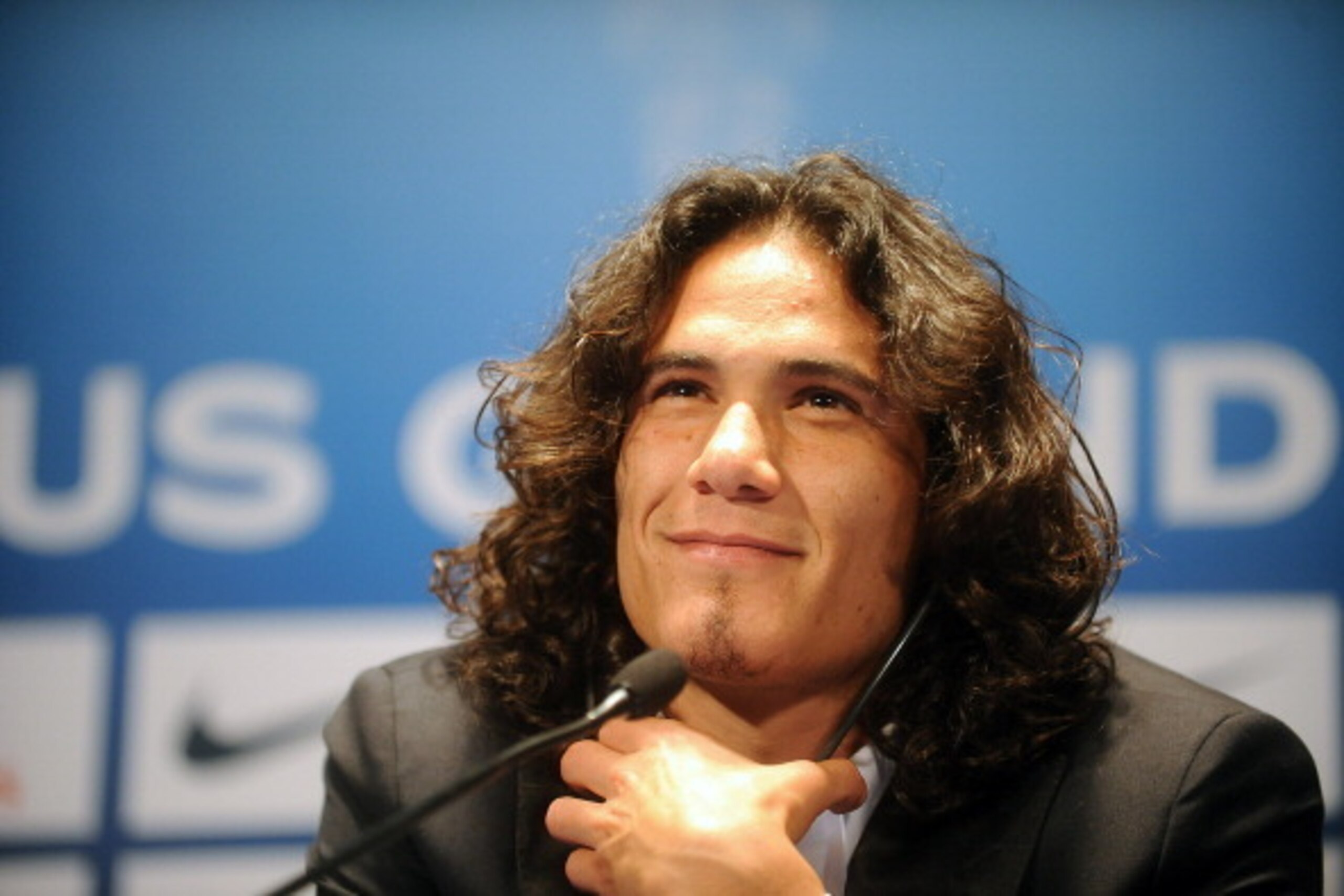 PARIS, FRANCE - JULY 16: Paris Saint-Germain's (PSG) new forward, Edinson Cavani, attends a press conference on July 16, 2013 in Paris, France. Cavani's transfer to Paris Saint-Germain football club is reported to have cost in the region of £55m. (Photo b