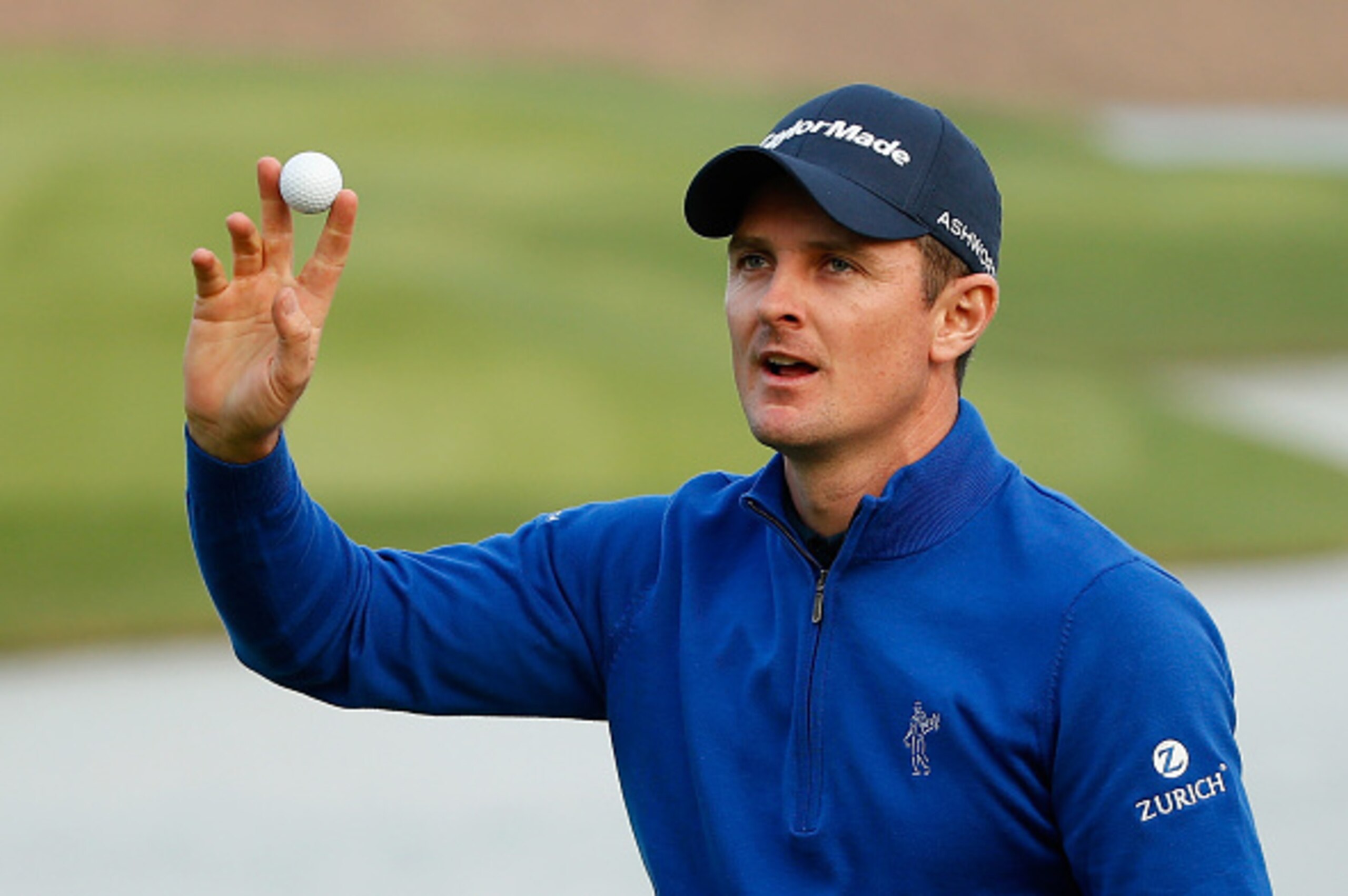 SHANGHAI, CHINA - NOVEMBER 02:  Justin Rose of England waves to the gallery on the 18th hole during the final round of the BMW Masters at Lake Malaren Golf Club on November 2, 2014 in Shanghai, China.  (Photo by Scott Halleran/Getty Images)