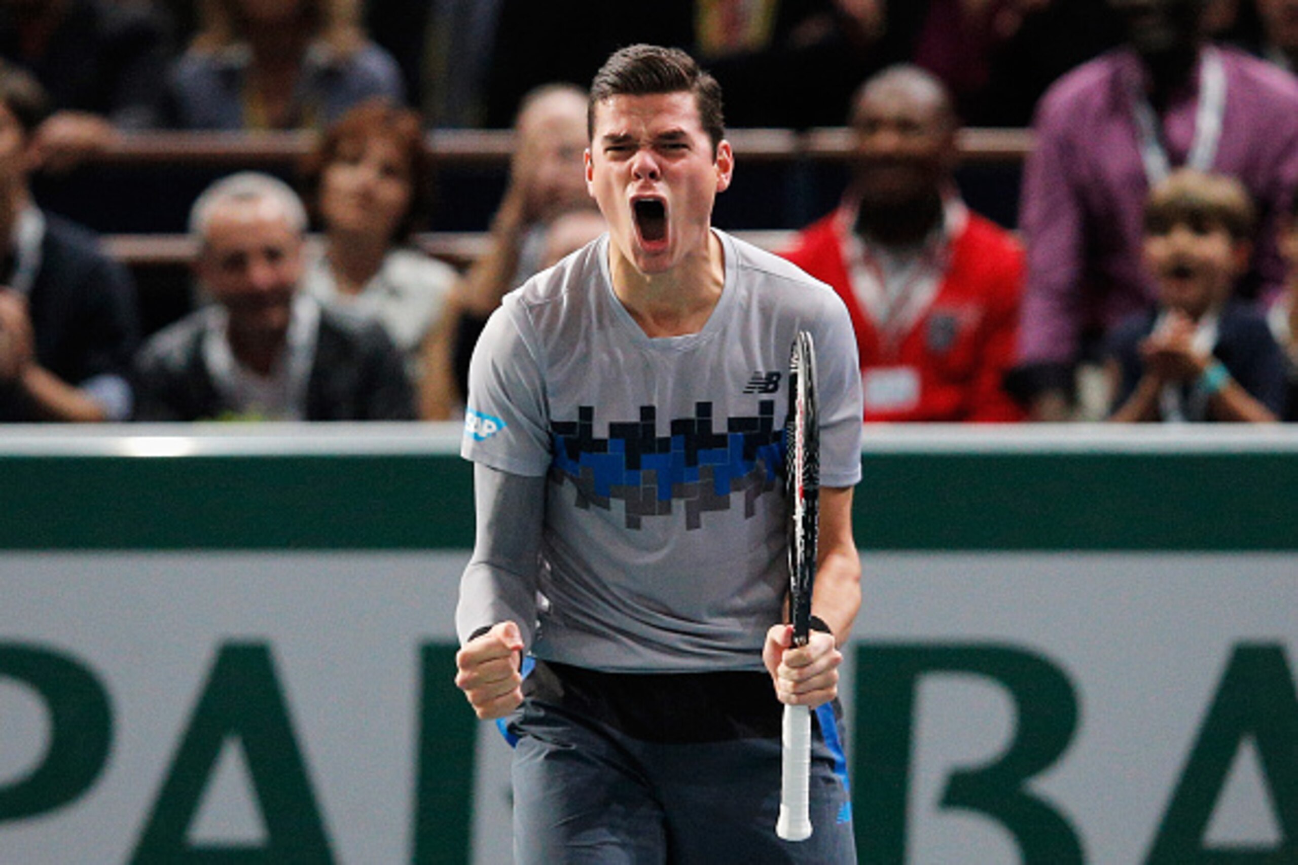 PARIS, FRANCE - NOVEMBER 01:  Milos Raonic of Canada celebrates victory against Tomas Berdych of Czech Republic after their semi final match during day 6 of the BNP Paribas Masters held at the at Palais Omnisports de Bercy on November 1, 2014 in Paris, Fr