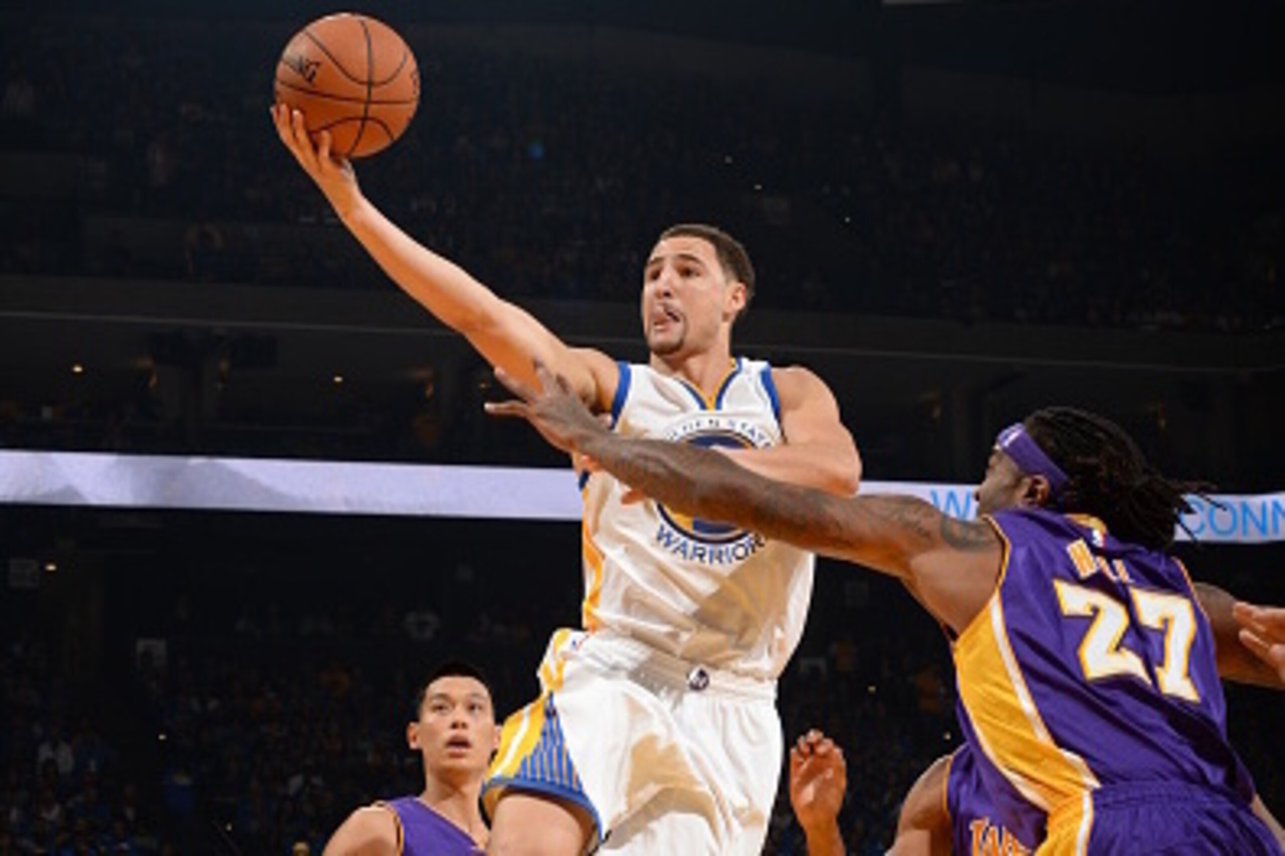 OAKLAND, CA - NOVEMBER 1: Klay Thompson #11 of the Golden State Warriors goes up for a shot against the Los Angeles Lakers on November 1, 2014 at Oracle Arena in Oakland, California. NOTE TO USER: User expressly acknowledges and agrees that, by downloadin