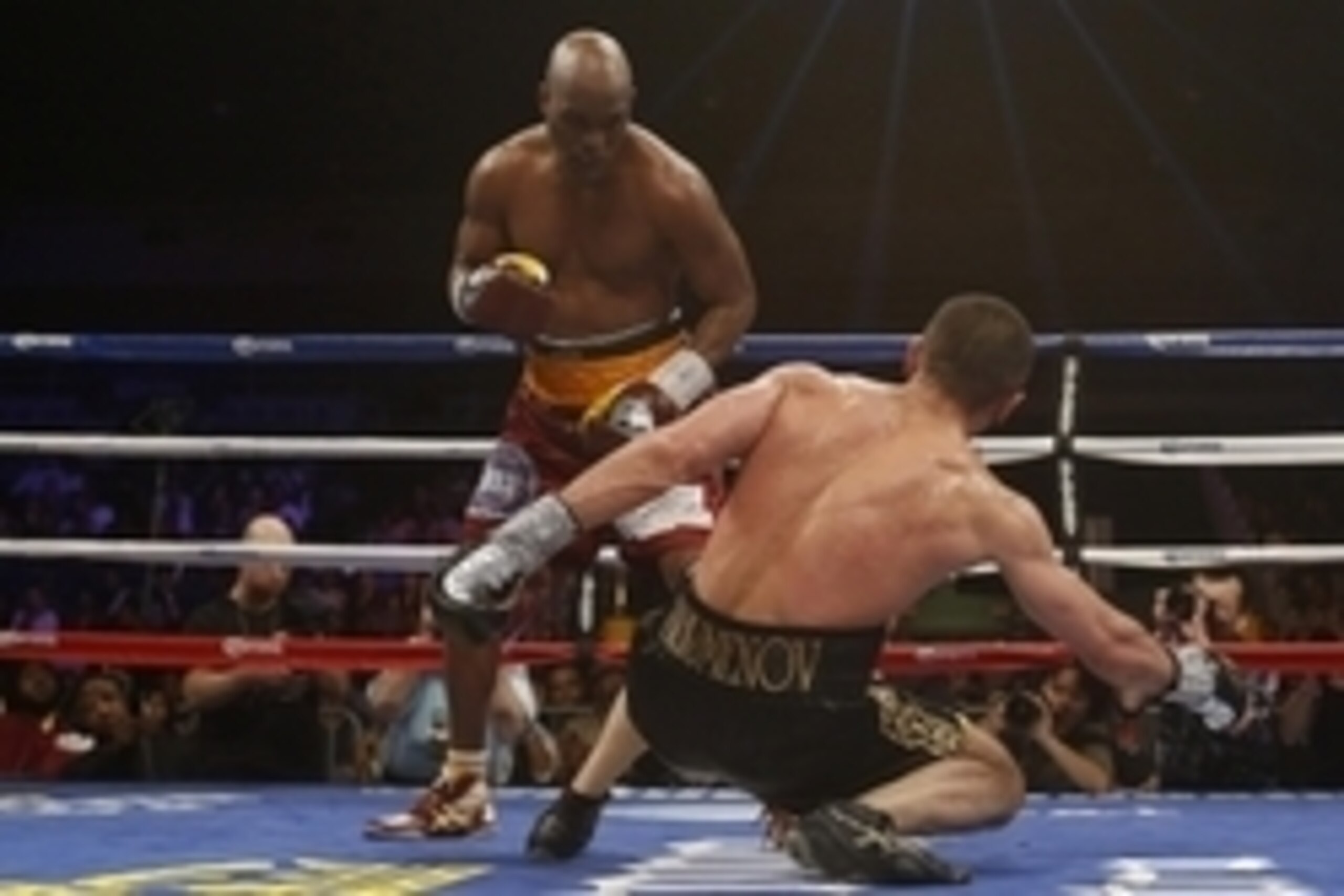 Apr 19, 2014; Washington, DC, USA; Bernard Hopkins  knocks down Beibut Shumenov during their bout at DC Armory. Mandatory Credit: Geoff Burke-USA TODAY Sports
