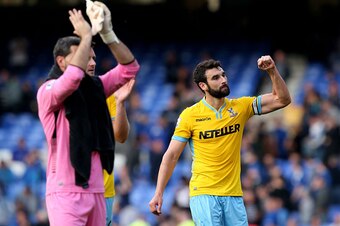 LIVERPOOL, ENGLAND - SEPTEMBER 21:  Mile Jedinak (R) of Crystal Palace and his teammates applaud the travelling fans following their team's 3-2 victory during the Barclays Premier League match between Everton and Crystal Palace at Goodison Park on Septemb