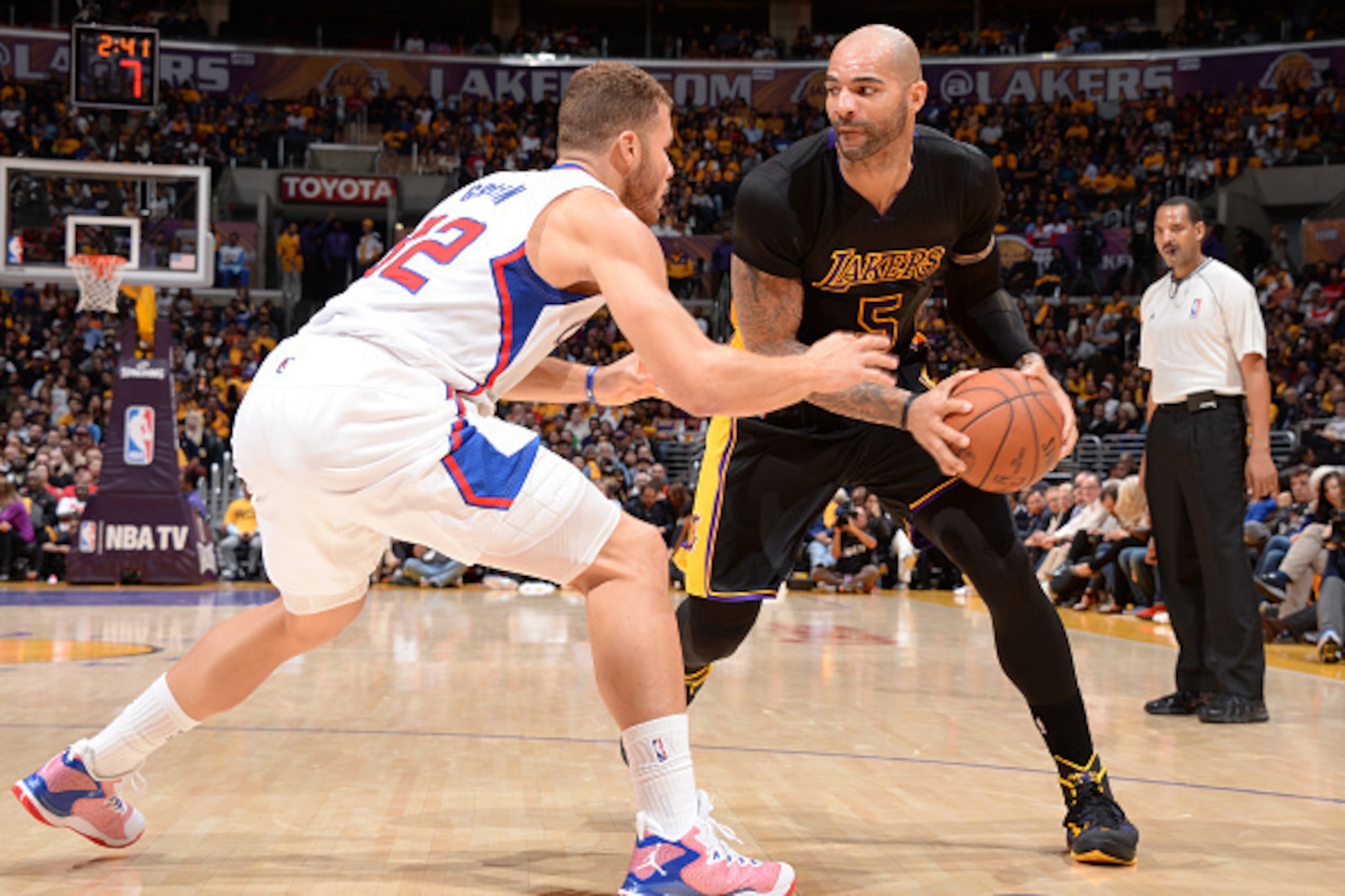 LOS ANGELES, CA - OCTOBER 31:  Carlos Boozer #5 of the Los Angeles Lakers handles the ball against the Los Angeles Clippers on October 31, 2014 at Staples Center in Los Angeles, California. NOTE TO USER: User expressly acknowledges and agrees that, by dow