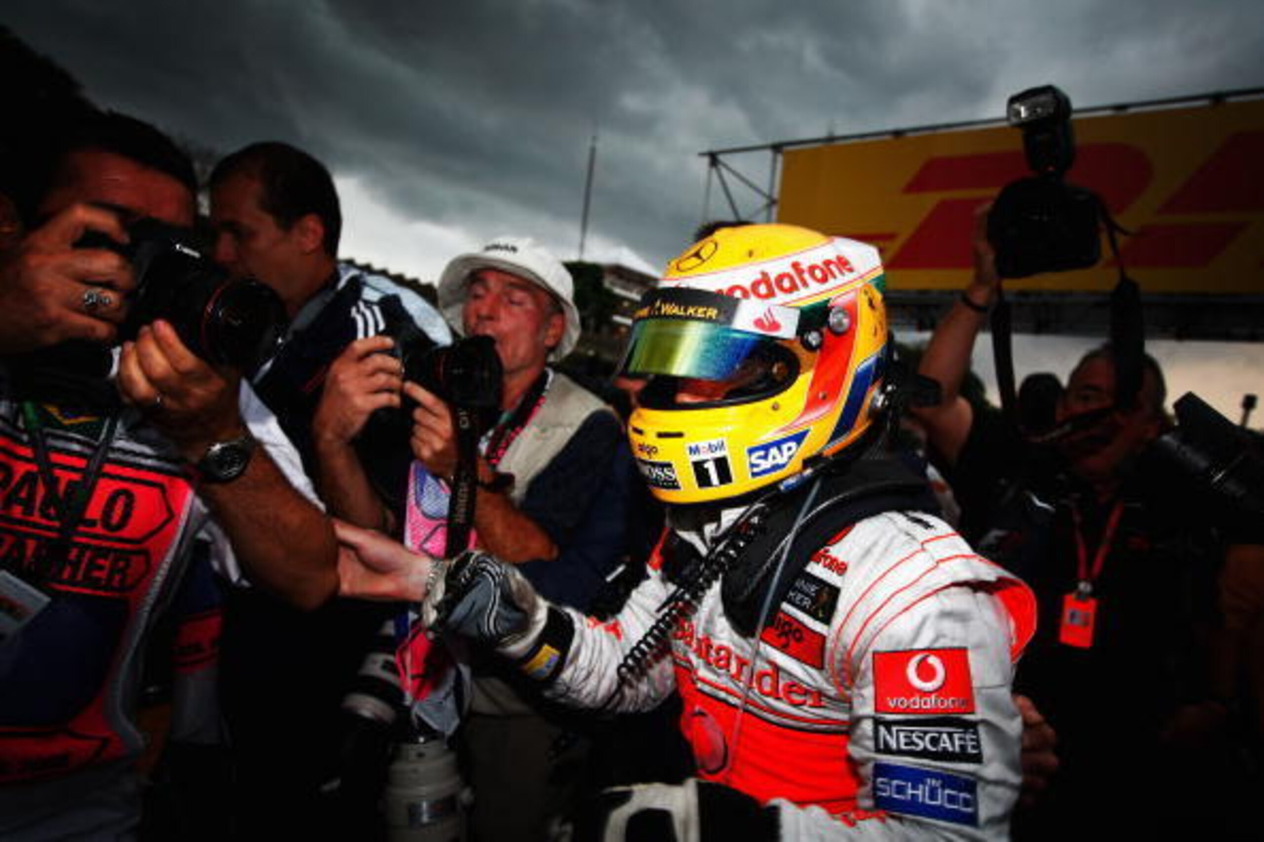 SAO PAULO, BRAZIL - NOVEMBER 02:  New Formula One World Champion Lewis Hamilton of Great Britain and McLaren Mercedes gets out of his car following the Brazilian Formula One Grand Prix at the Interlagos Circuit on November 2, 2008 in Sao Paulo, Brazil.  (