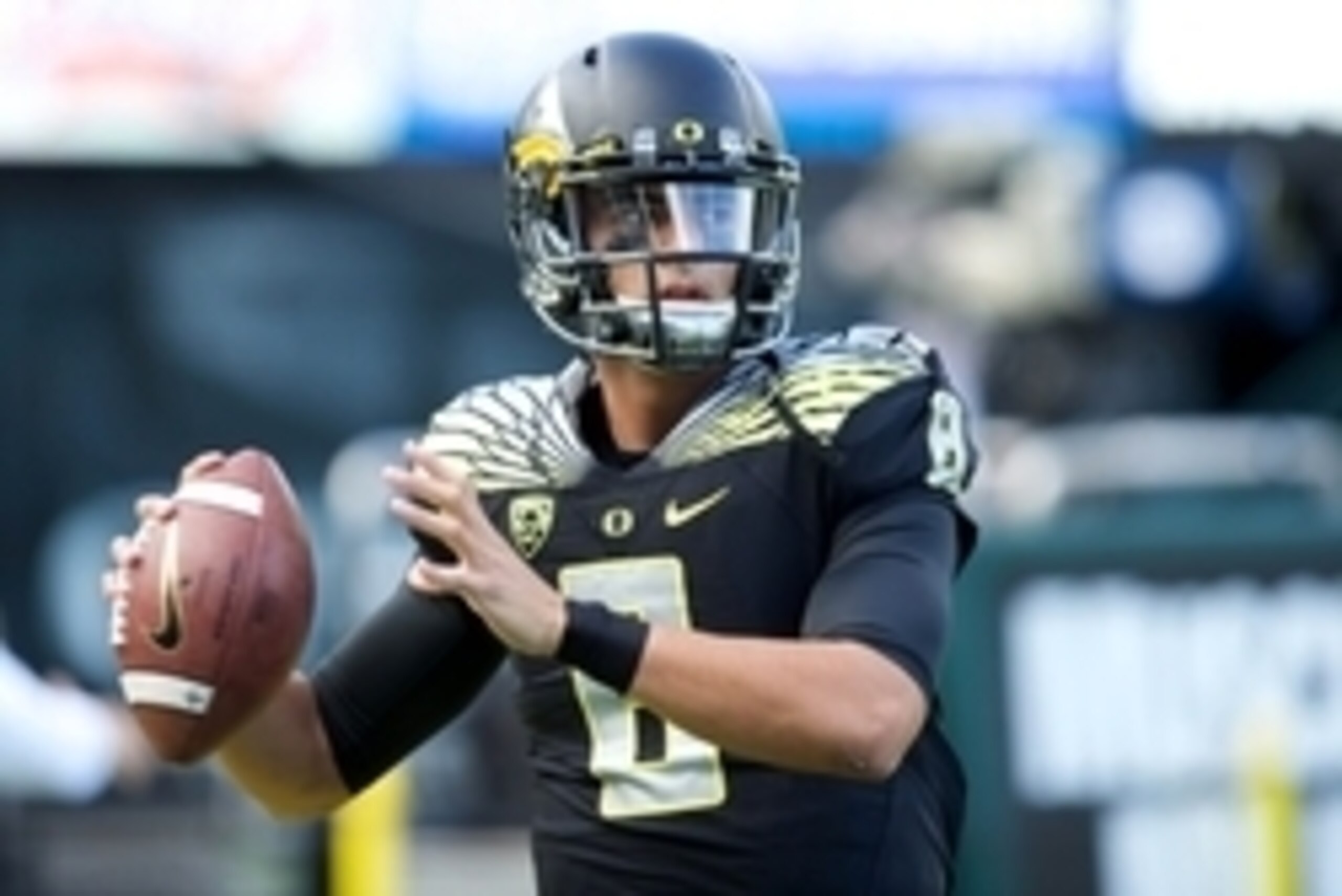 Nov 1, 2014; Eugene, OR, USA; Oregon Ducks quarterback Marcus Mariota (8) throws the ball before the game against the Stanford Cardinal at Autzen Stadium. Mandatory Credit: Scott Olmos-USA TODAY Sports