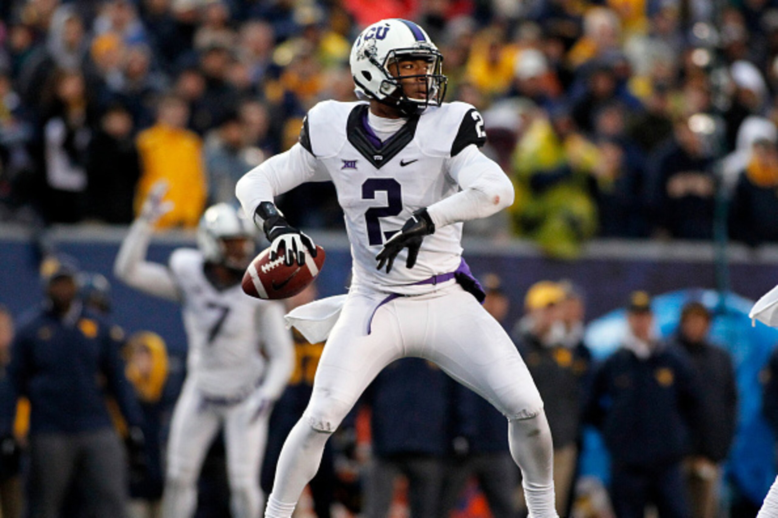 MORGANTOWN, WV - NOVEMBER 01:  Trevone Boykin #2 of the TCU Horned Frogs drops back to pass in the second half during the game against the West Virginia Mountaineers on November 1, 2014 at Mountaineer Field in Morgantown, West Virginia.  TCU defeated WVU 