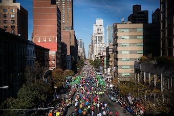 NEW YORK, NY - NOVEMBER 02:  Runners run up First Avenue as seen from the 59th Street Bridge during the TCS New York City Marathon on November 2, 2014 inof New York City.  (Photo by Andrew Burton/Getty Images)