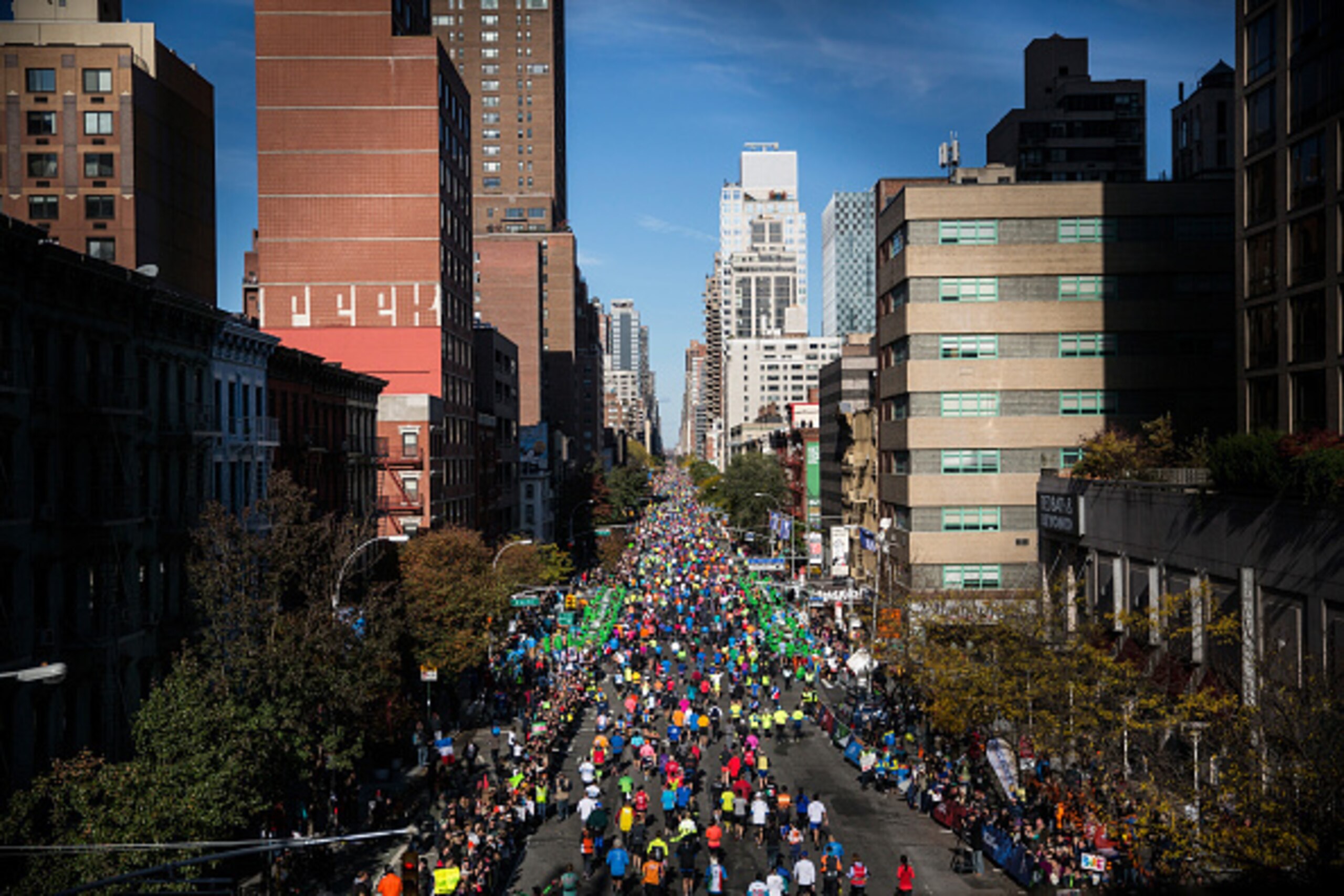 NEW YORK, NY - NOVEMBER 02:  Runners run up First Avenue as seen from the 59th Street Bridge during the TCS New York City Marathon on November 2, 2014 inof New York City.  (Photo by Andrew Burton/Getty Images)